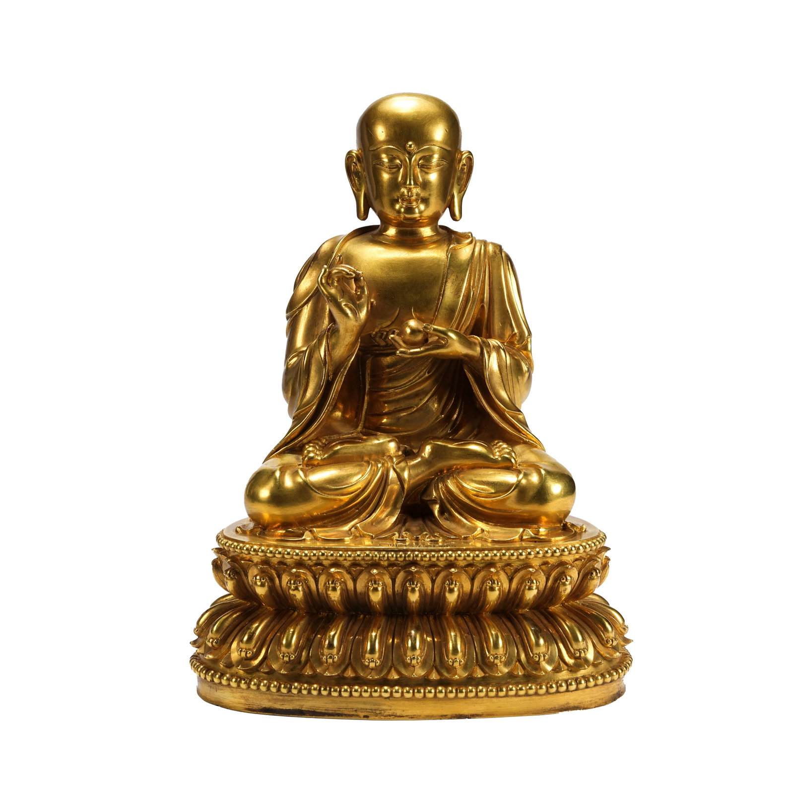 GILT BRONZE KSITIGARBHA BODHISATTVA STATUE YONGLE PERIOD MING DYNASTY: A quintessential example of Ming Dynasty imperial statues, this piece is crafted of gilded bronze with full and lustrous gilded finish all over. Ksitigarbha Bodhisattva appears in the form of a monk w
