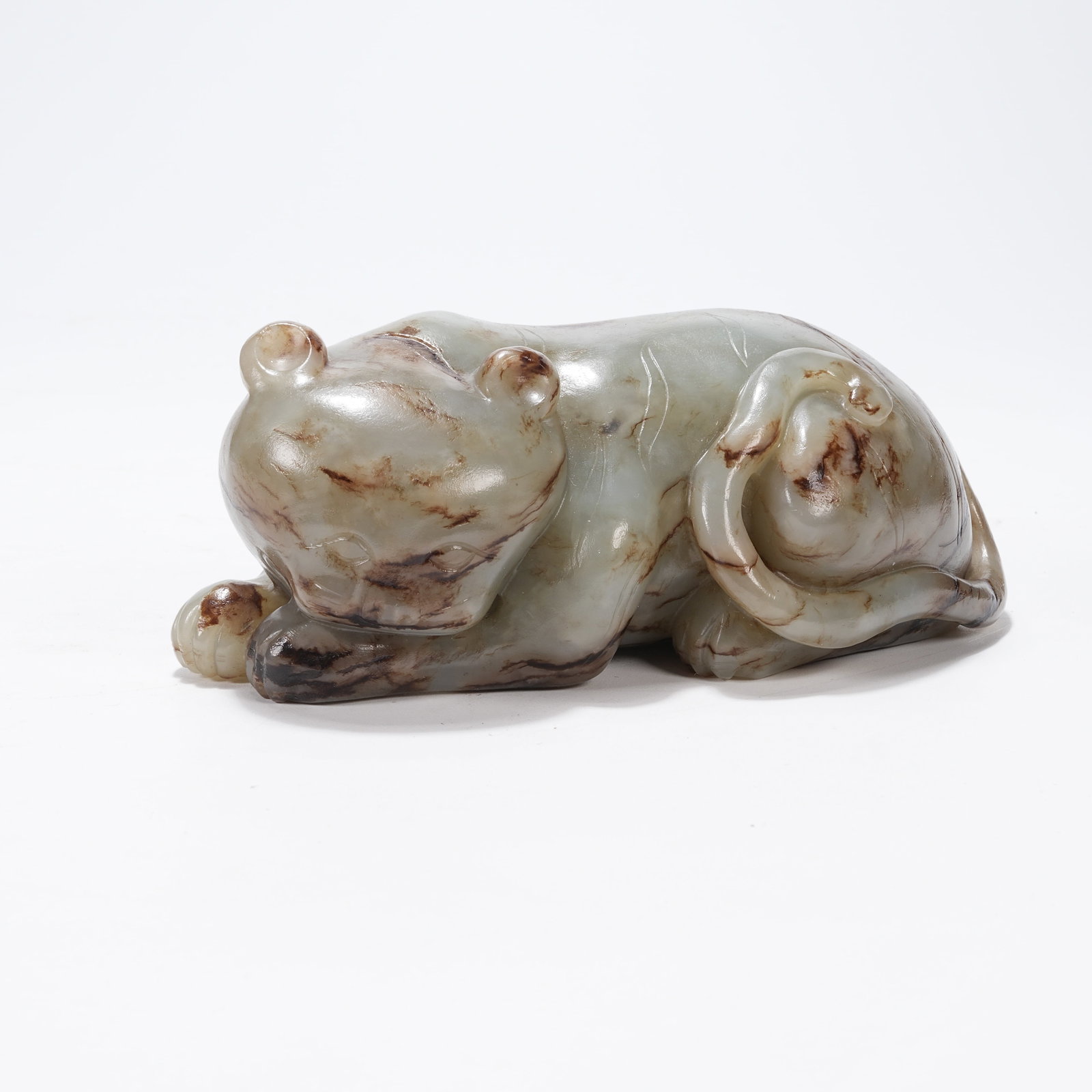 A ANCIENT JADE RECUMBENT BEAST ORNAMENT (1 of 8)