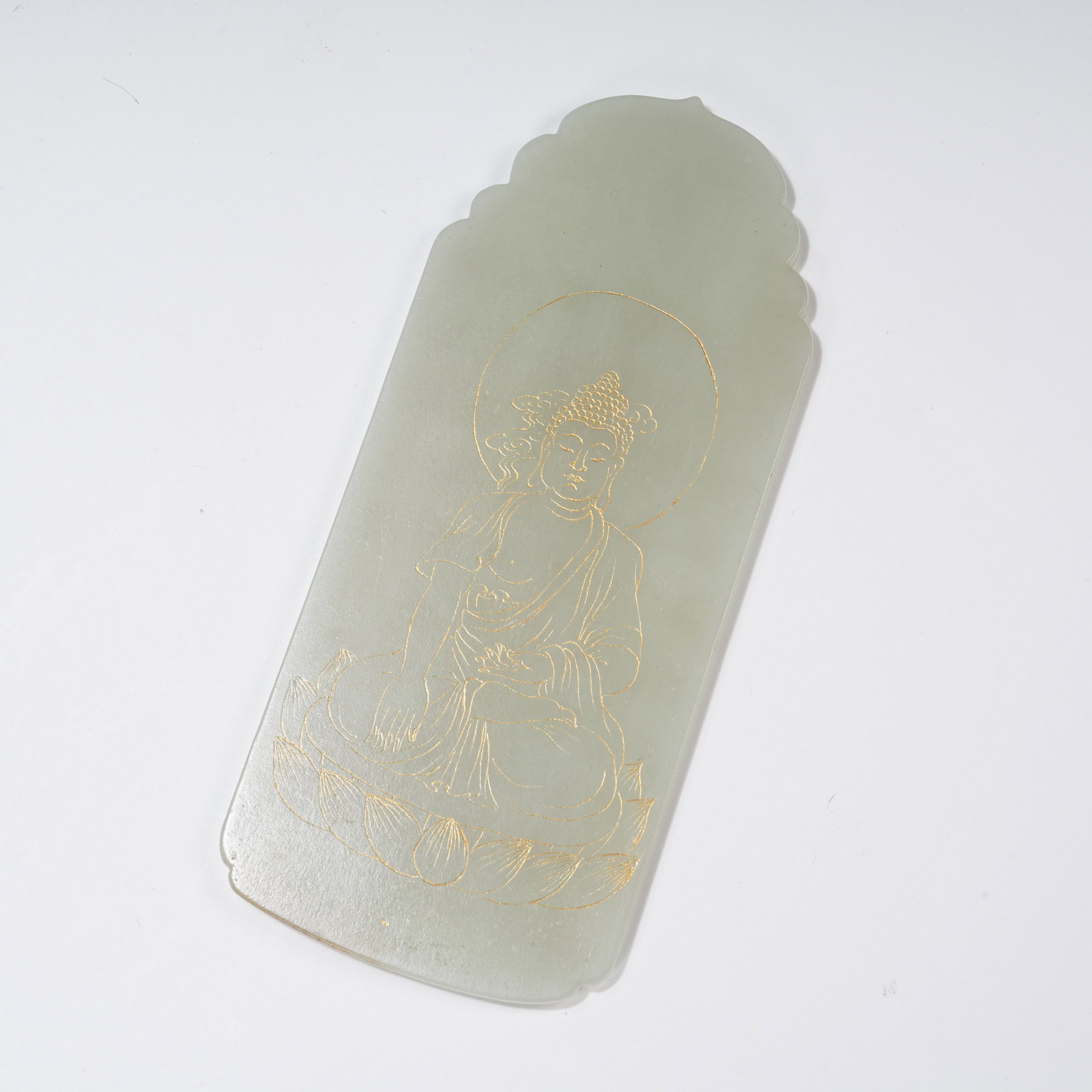 A GILDED SAKYAMUNI BUDDHA PLAQUE OF HETIAN JADE (1 of 9)