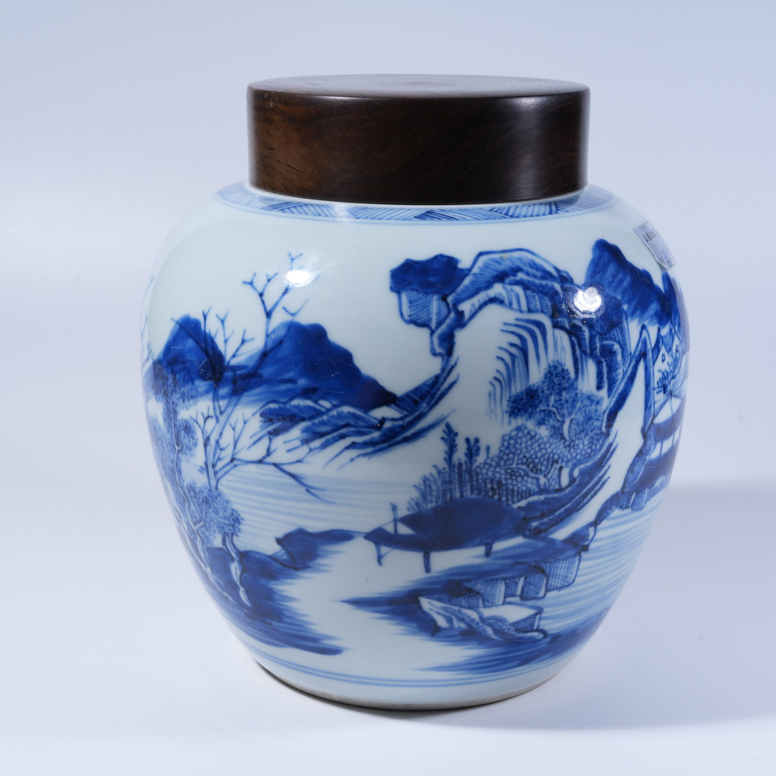 A BLUE AND WHITE COVERED JAR WITH LANDSCAPE AND FIGURE STORY PATTERN (1 of 9)