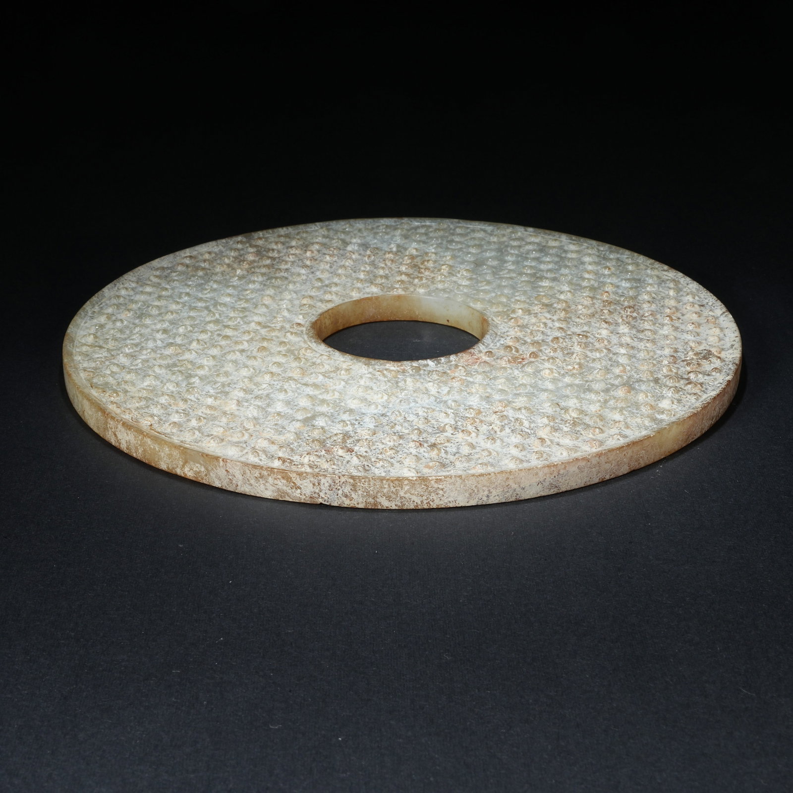 A ANCIENT JADE BI DISC WITH SCROLLED CLOUD PATTERN - 10