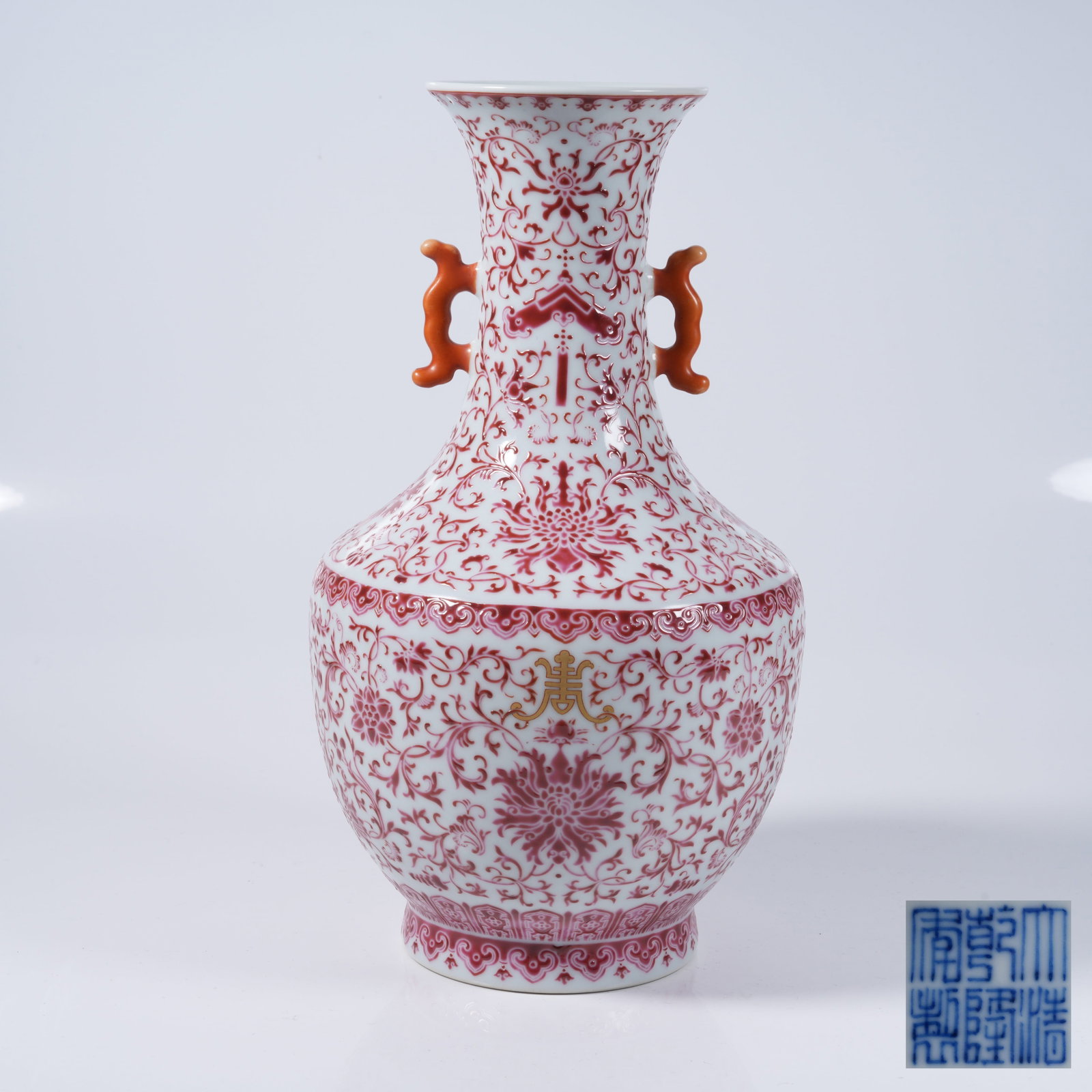A DOUBLE-EARED ZUN WITH INTERLOCKING PRECIOUS FLOWER AND LONGEVITY SUPPORT PATTERN IN CARMINE GLAZE (1 of 10)