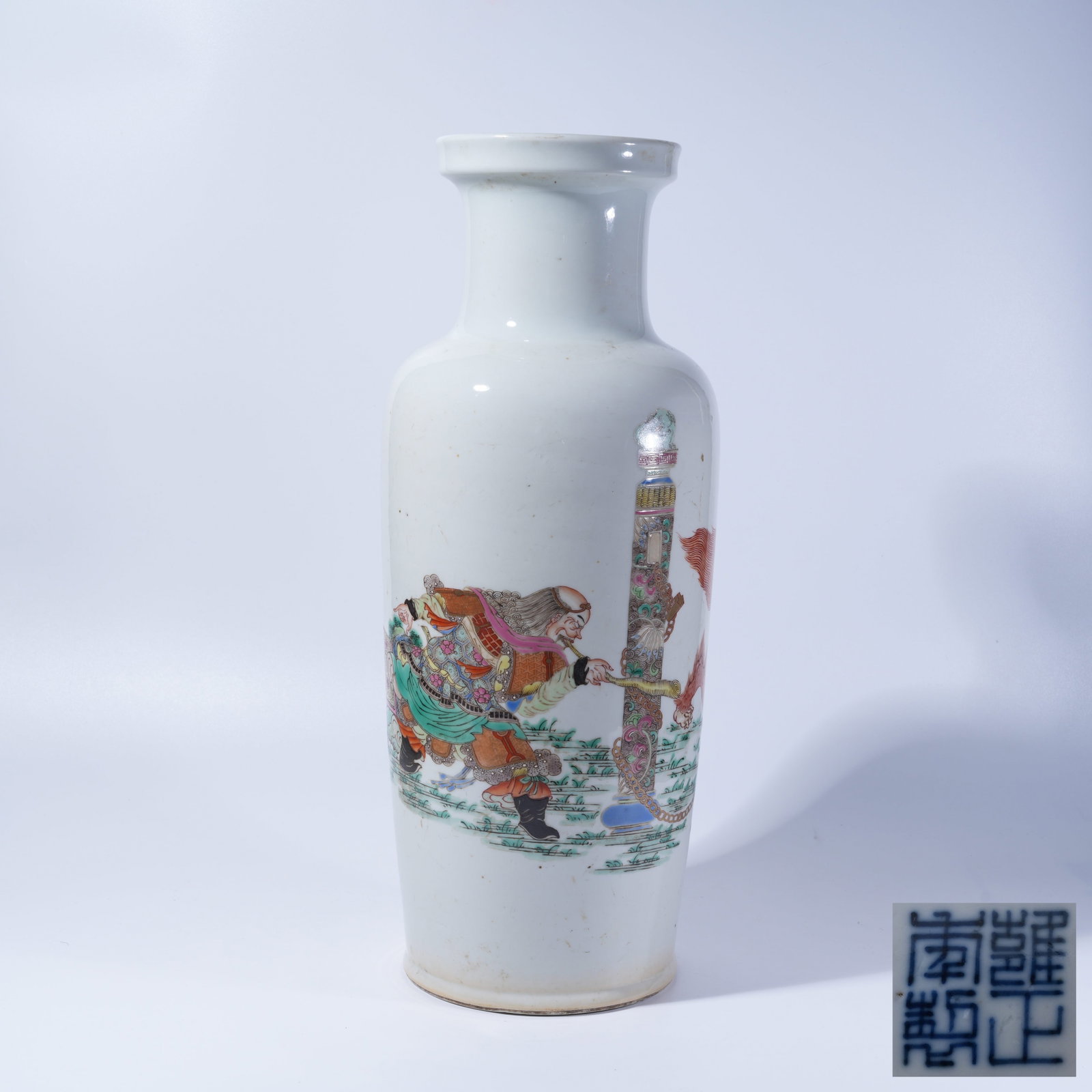 A FAMILLE ROSE IRON RED MALLET VASE WITH FOREIGNER PLAYING LION PATTERN: Famille Rose Iron Red Mallet Vase with Foreigner Playing Lion Pattern