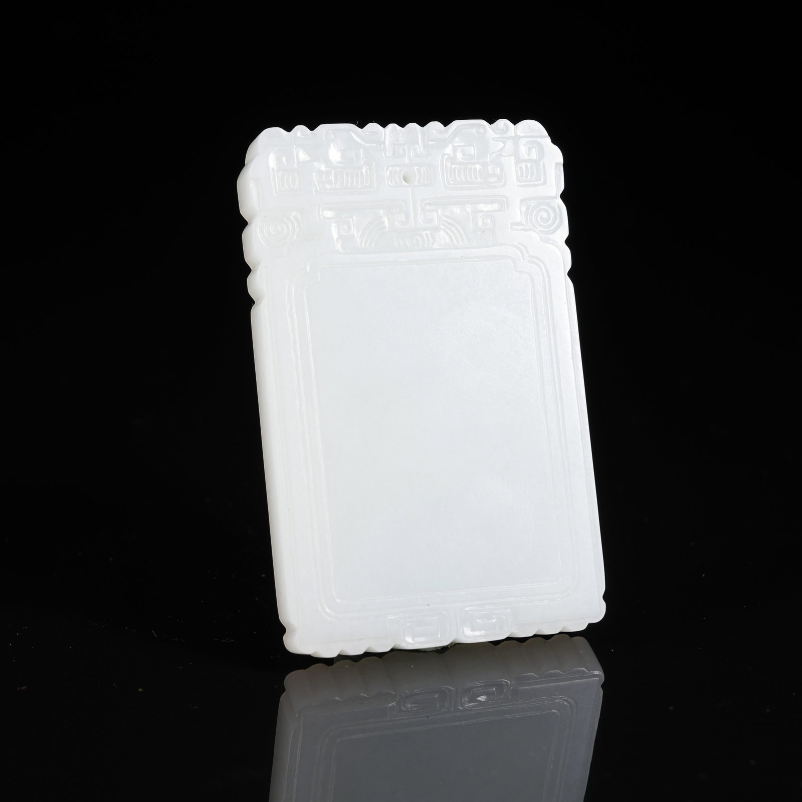 A WHITE HETIAN JADE PLAIN PLAQUE (1 of 9)