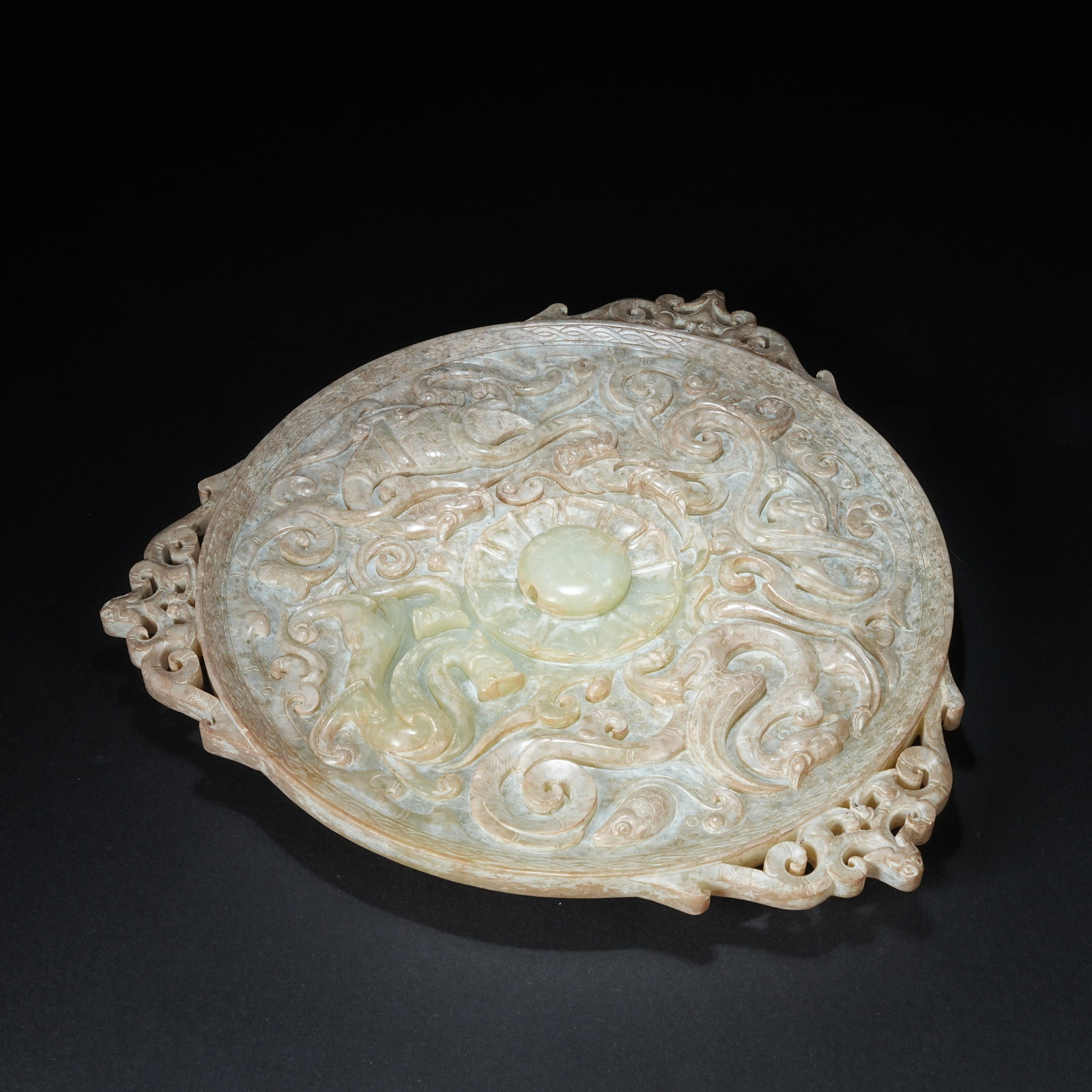 A ANCIENT JADE MIRROR WITH FOUR DIVINE BEASTS PATTERN (1 of 9)