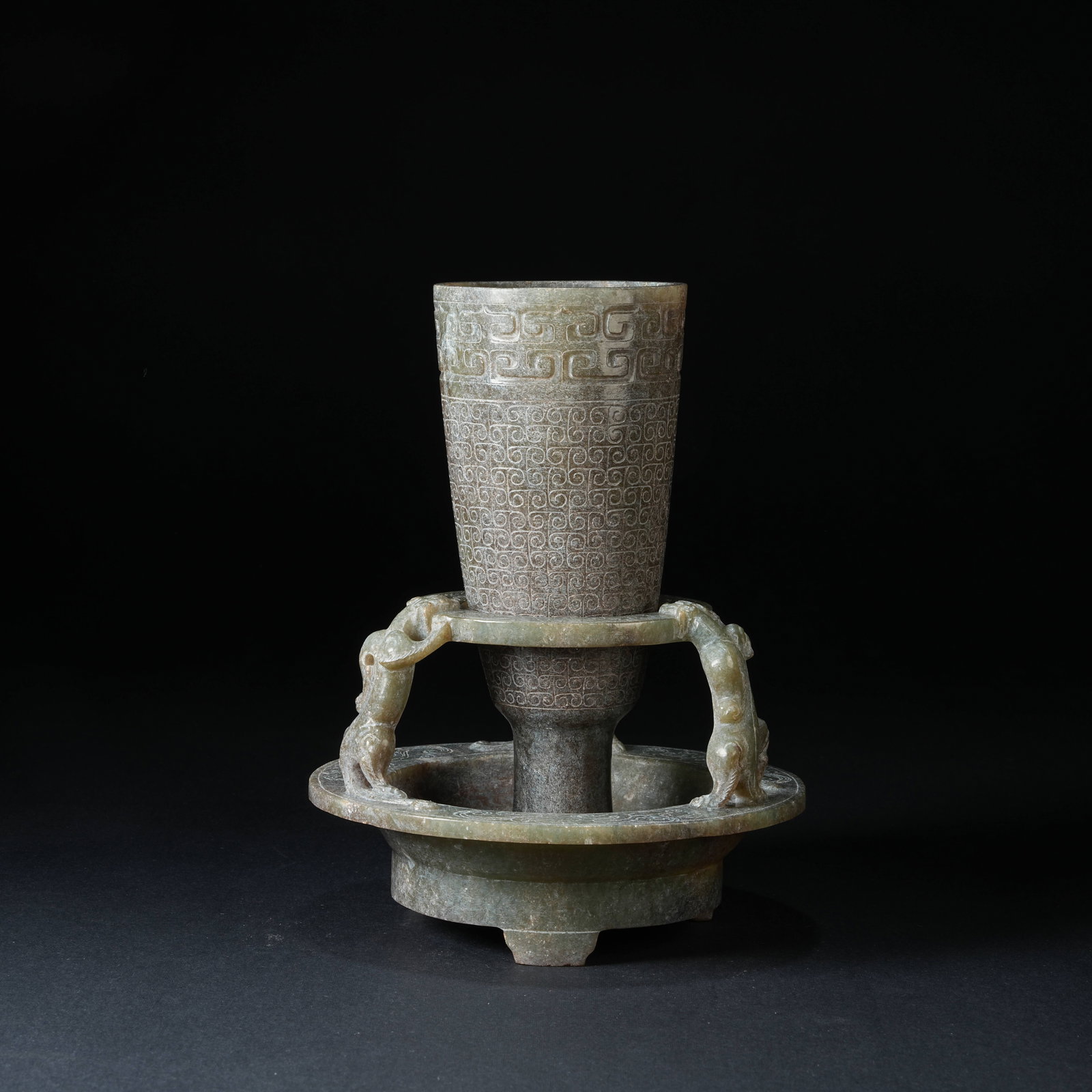 A SET OF ANCIENT JADE HIGH-FOOT CUPS (1 of 11)