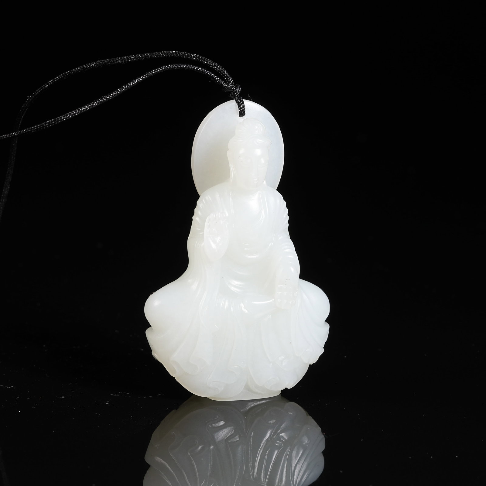 A HETIAN JADE BUDDHA PENDANT (1 of 9)