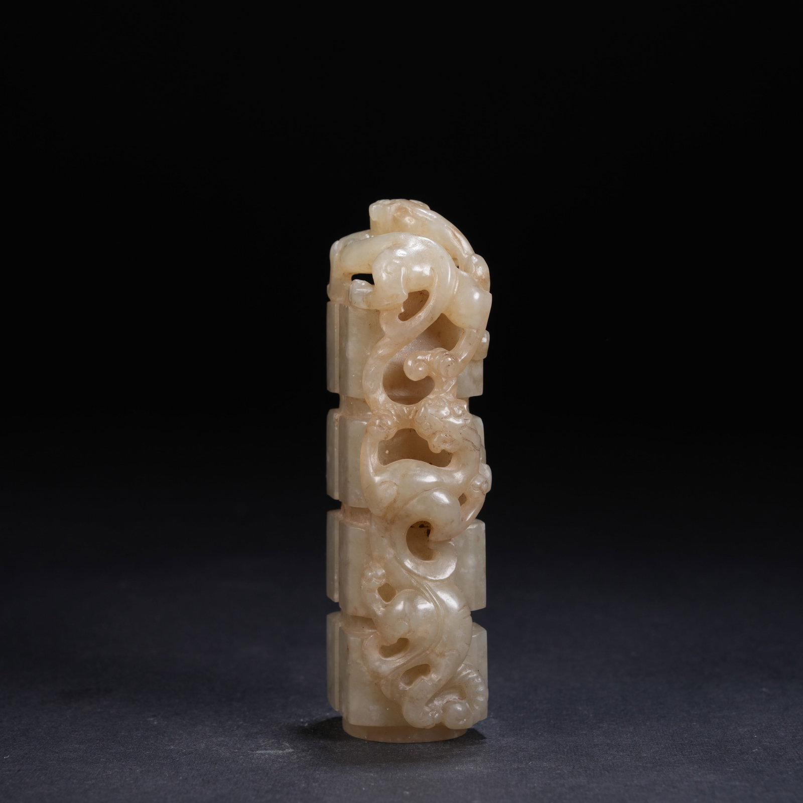 A ANCIENT JADE BELT HOOK WITH CHI DRAGON MOTIF (1 of 9)