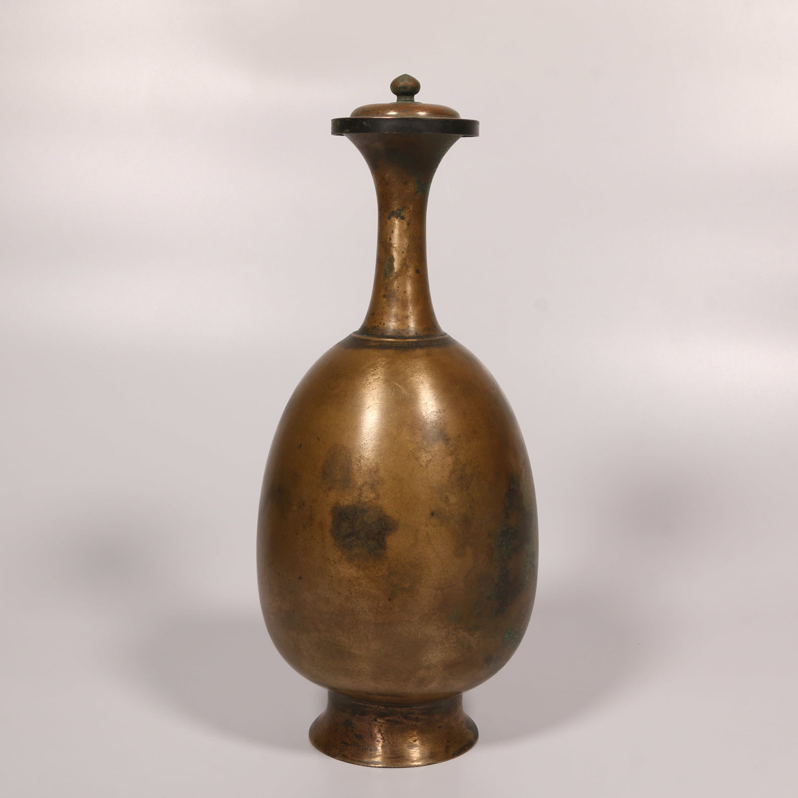 A BRONZE PURIFICATION BOTTLE - 8