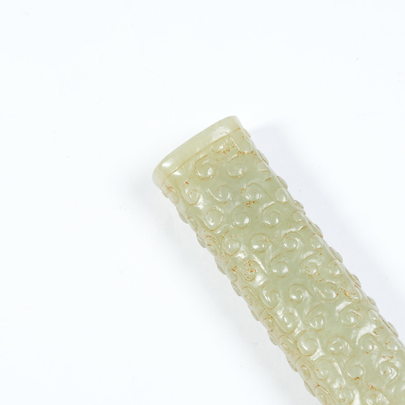 A ANCIENT JADE CYLINDRICAL BEAD WITH INTERLOCKING CLOUD PATTERNS - 2