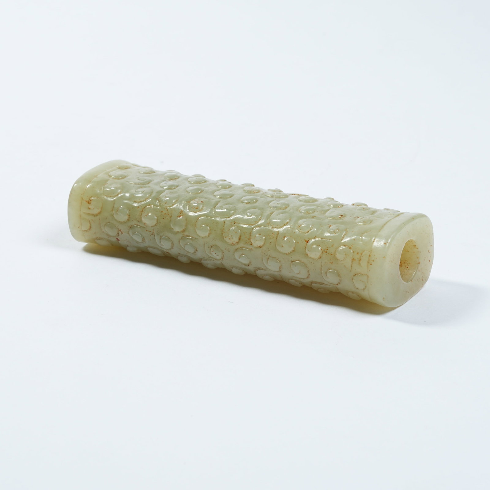 A ANCIENT JADE CYLINDRICAL BEAD WITH INTERLOCKING CLOUD PATTERNS - 5