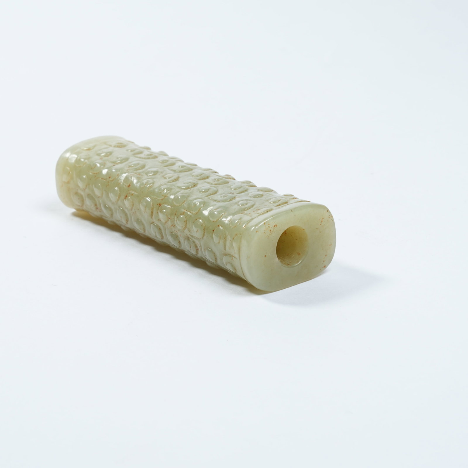 A ANCIENT JADE CYLINDRICAL BEAD WITH INTERLOCKING CLOUD PATTERNS - 7