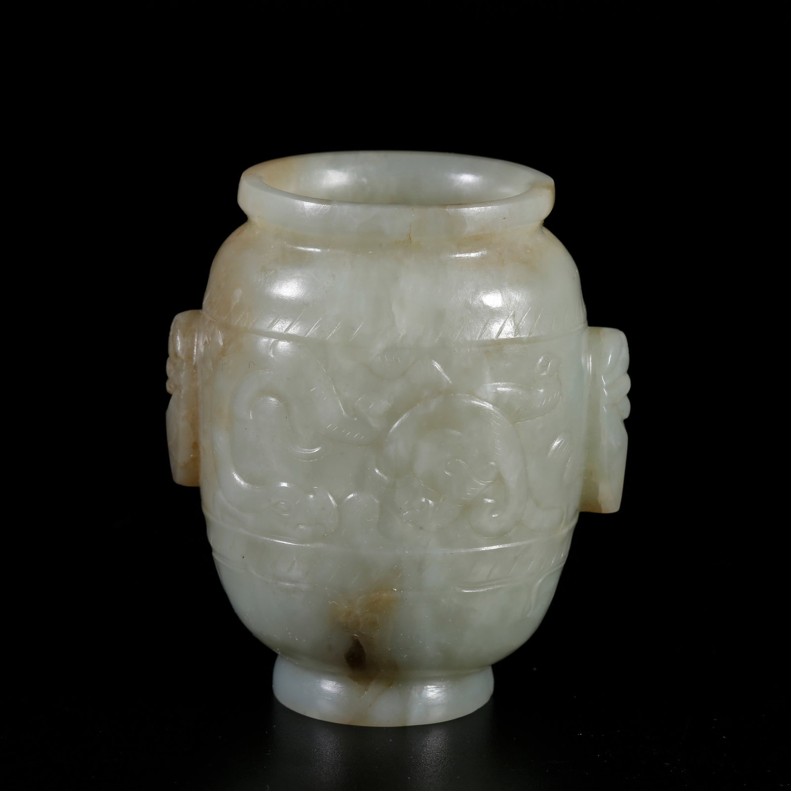 A HETIAN JADE TWO-EARED VASE CARVED WITH BEAST MASK PATTERNS (1 of 10)
