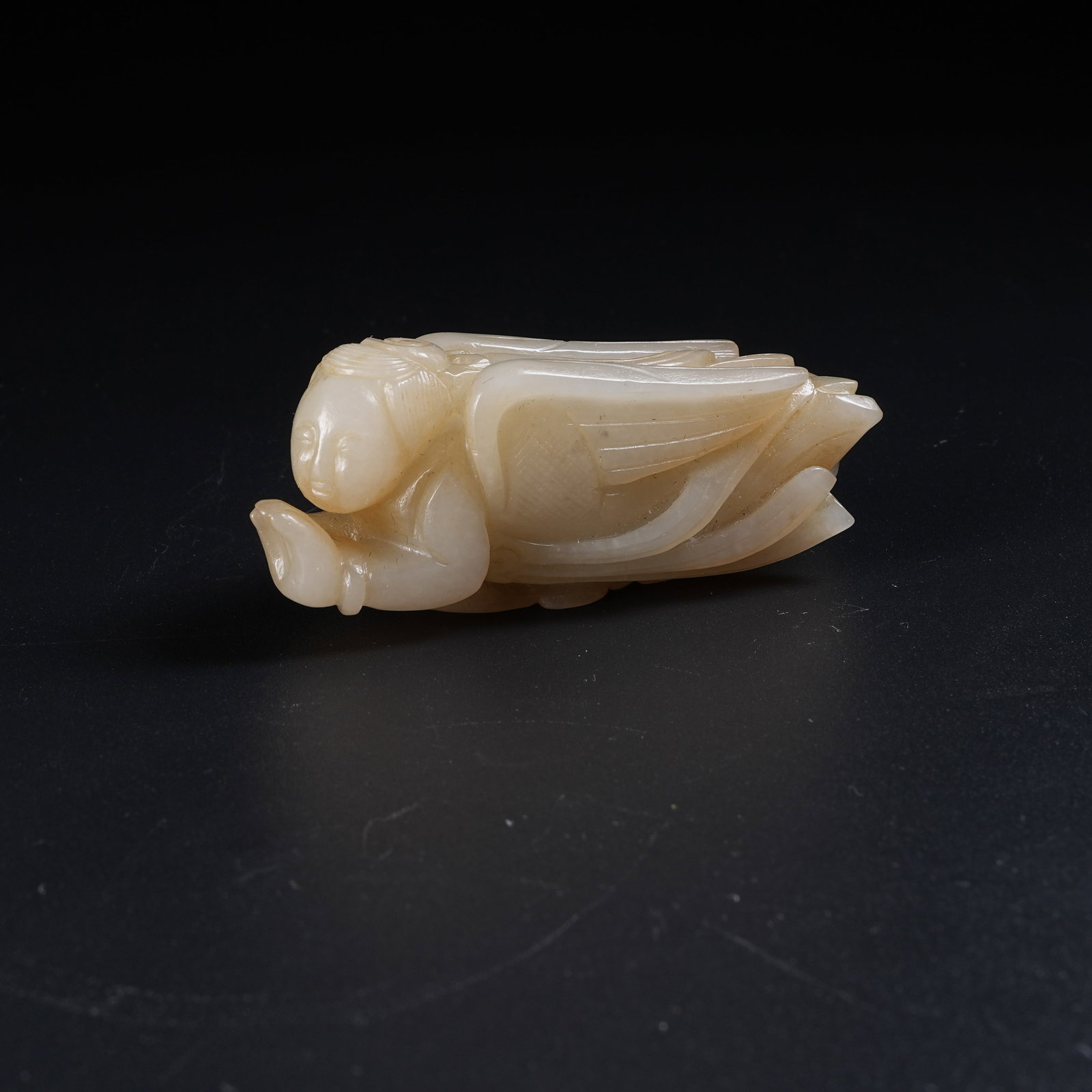 A HETIAN JADE HANGING ORNAMENT OF FLYING APSARAS: Hetian Jade Hanging Ornament of Flying Apsaras