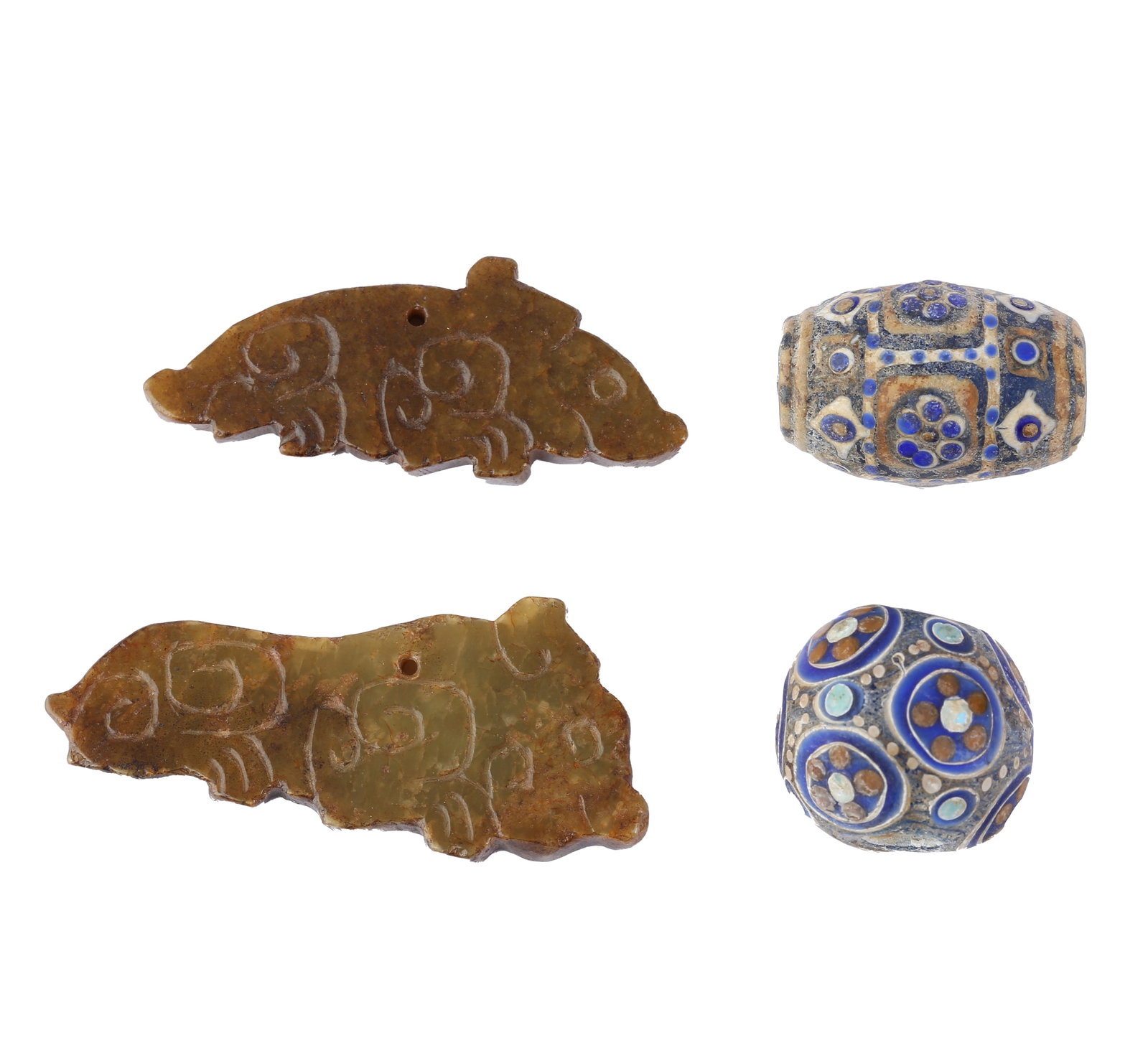 SET OF FOUR PIECES: WESTERN ZHOU JADE TIGER PENDANT AND WARRING STATES DRAGONFLY EYE GLASS BEADS: This lot comprises two sets of ancient artifacts: a pair of Western Zhou jade tiger pendants and a pair of Warring States dragonfly-eye glass beads, both representative ornaments of their respective e