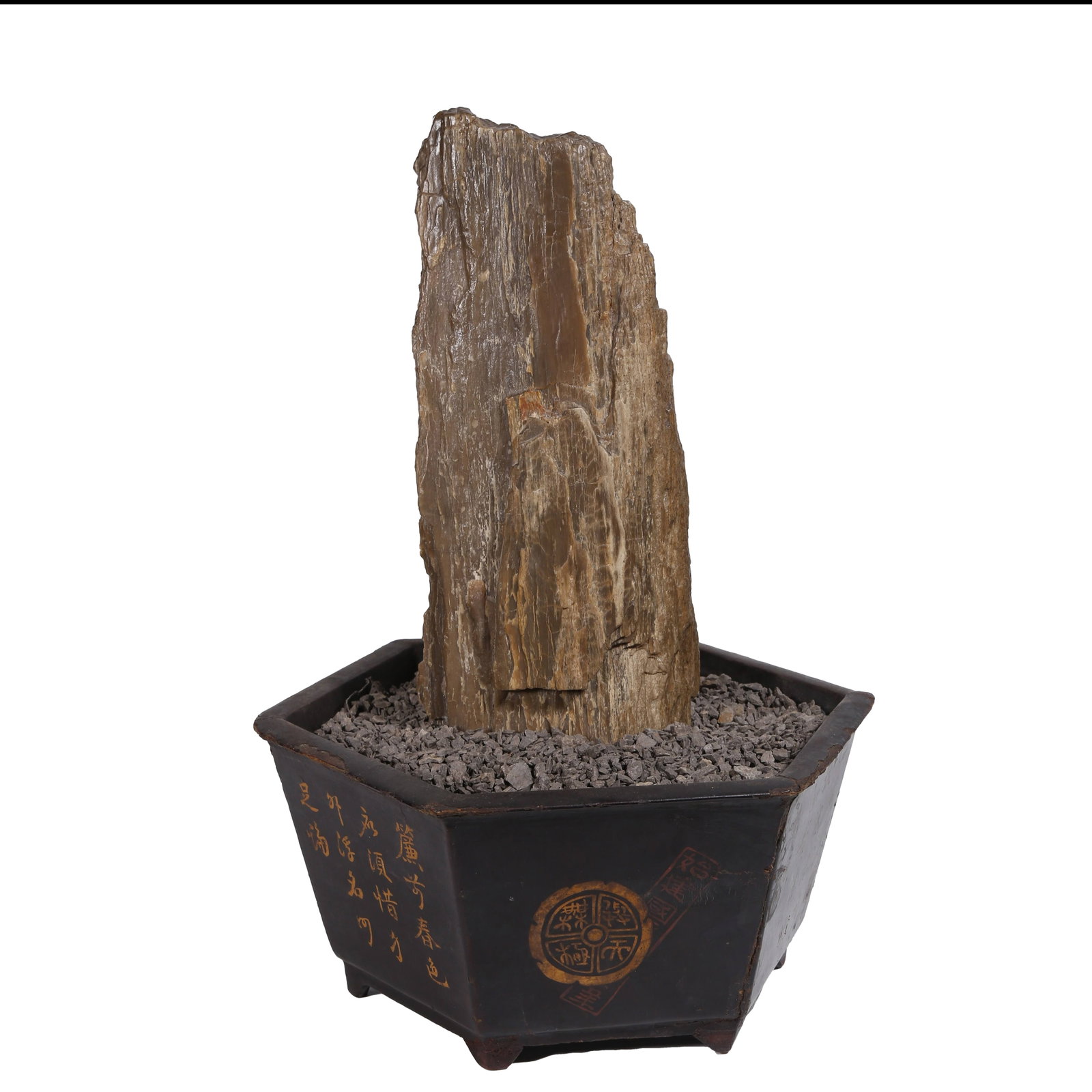 NATURAL FOSSIL WOOD MOUNTAIN ORNAMENT, REPUBLIC OF CHINA: Natural wood fossil retaining the grain of primitive wood with archaic and rugged hues, towering steep form and serene artistic conception. A classic ornamental stone ornament for study rooms with bot