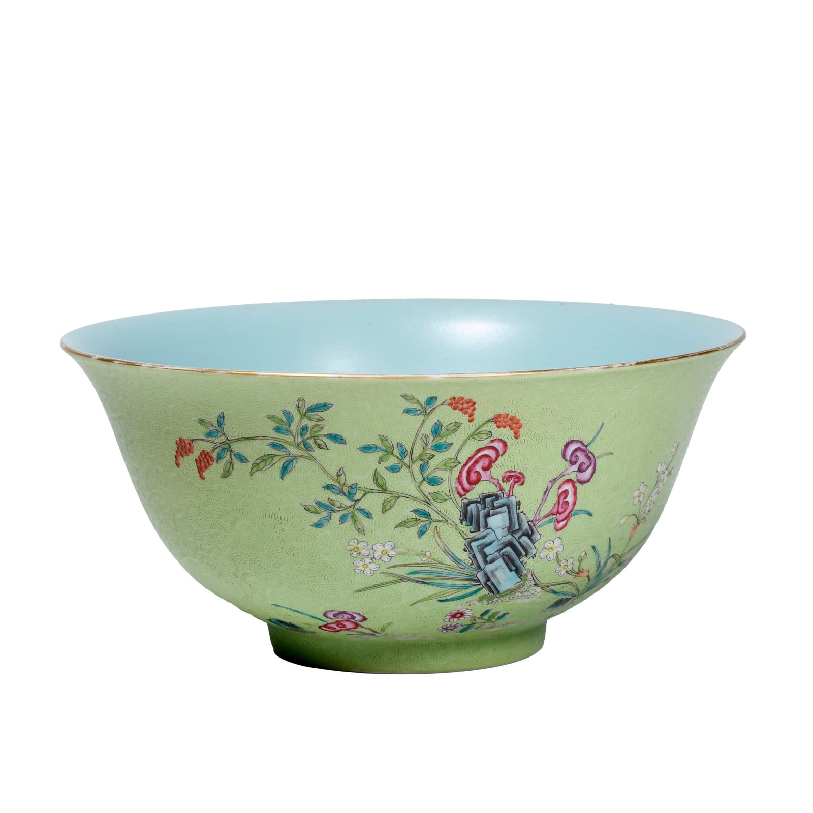 FAMILLE ROSE BOWL WITH IMMORTALS AND CRANES WISHING LONGEVITY ON CARVED GREEN GROUND, QIANLONG: This is an official kiln carved-ground famille rose bowl made during the Qianlong reign of the Qing Dynasty. Its exterior is covered with apple-green glaze ground fully decorated with carved-line craf
