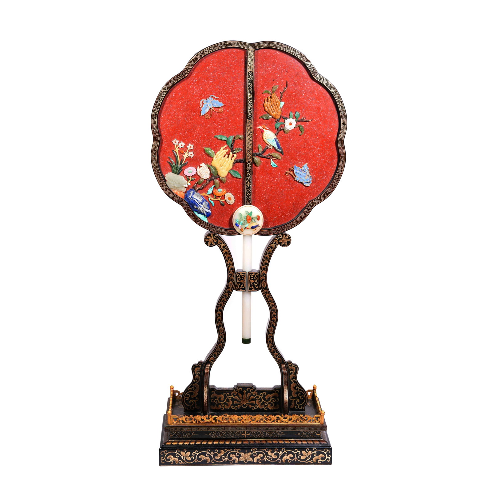 PLUM-BLOSSOM-SHAPED PALACE FAN OF RED-SPRINKLED LACQUER WITH HUNDRED TREASURES INLAY AND GILDED: This is an imperial palace display fan with a fan face shaped as plum blossom and begonia, standing 75 centimeters in total height, complete with its original full set of black lacquer gilded fan stan