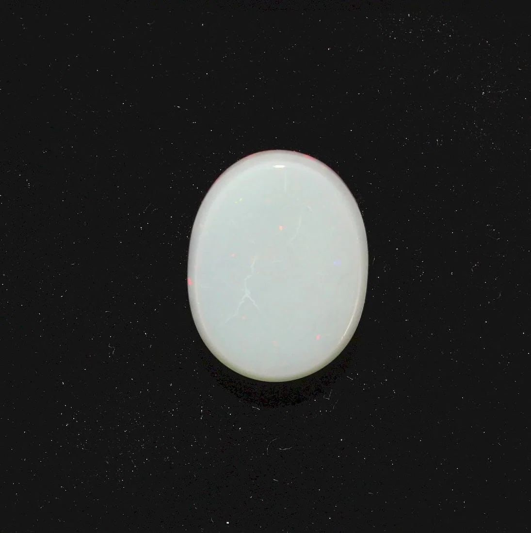 AUSTRALIAN OVAL SEMI-BLACK SOLID OPAL - 2