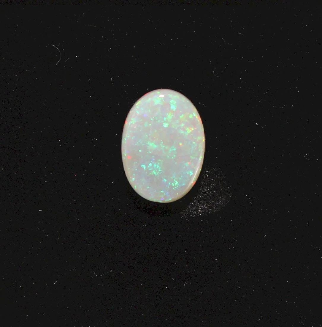 AUSTRALIAN OVAL SEMI-BLACK SOLID OPAL - 2