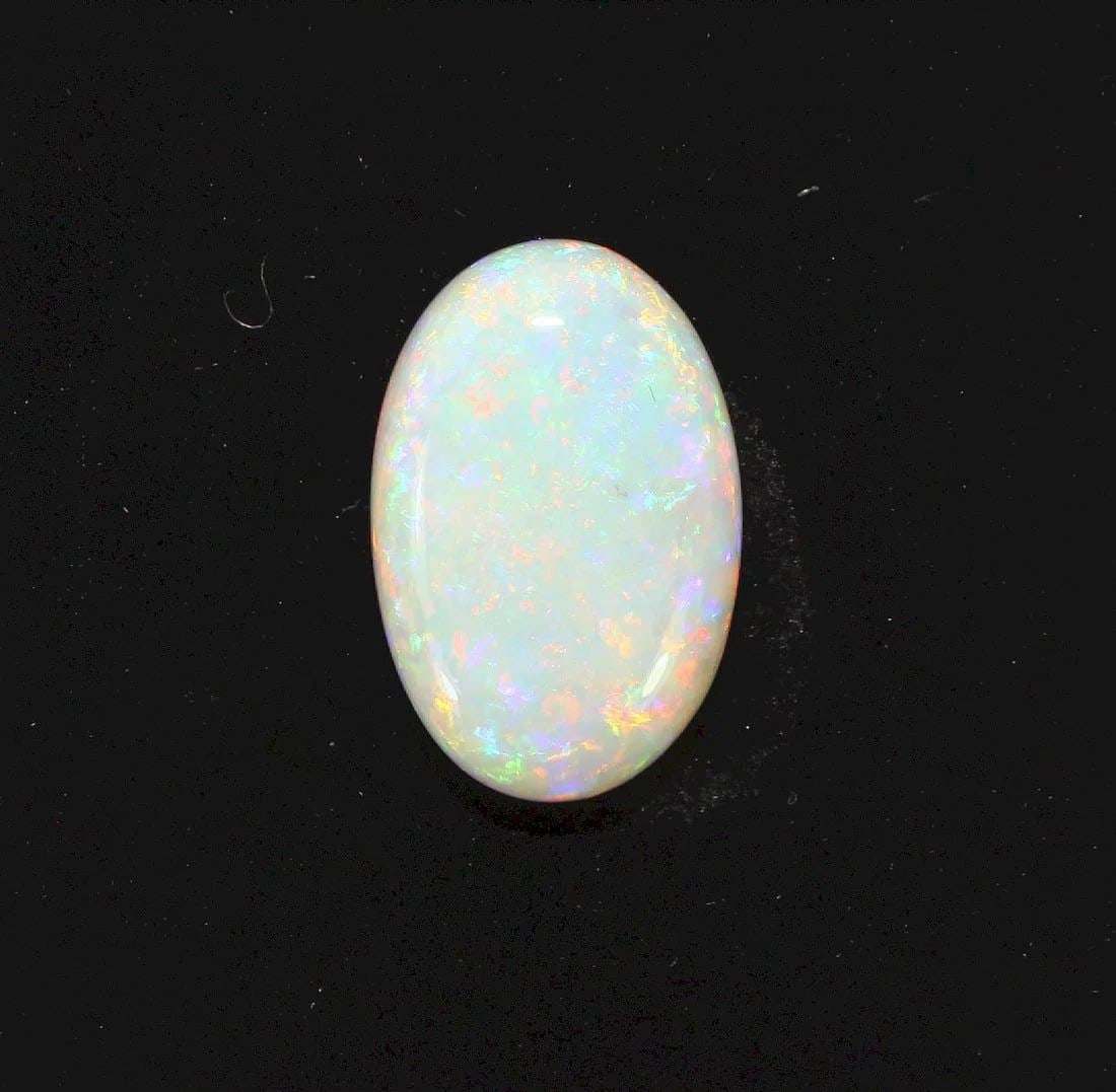 AUSTRALIAN OVAL-SHAPED SEMI-BLACK SOLID OPAL: Australian Oval-shaped Semi-Black Solid Opal