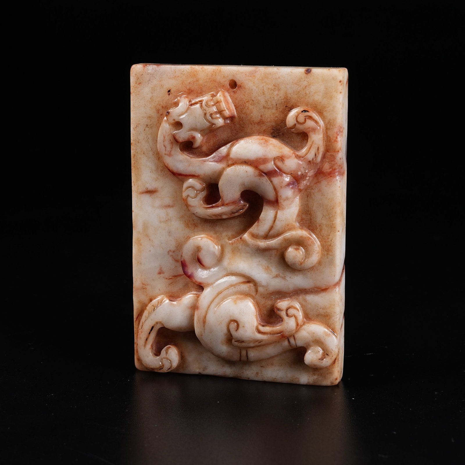 A ARCHAIC JADE PLAQUE WITH CHI DRAGON PATTERN (1 of 8)