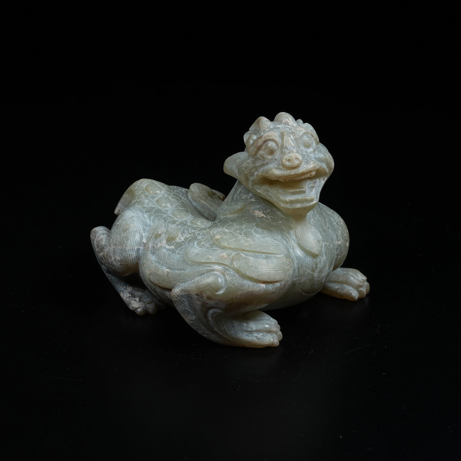 A ANCIENT JADE EVIL-WARDING BEAST (1 of 8)