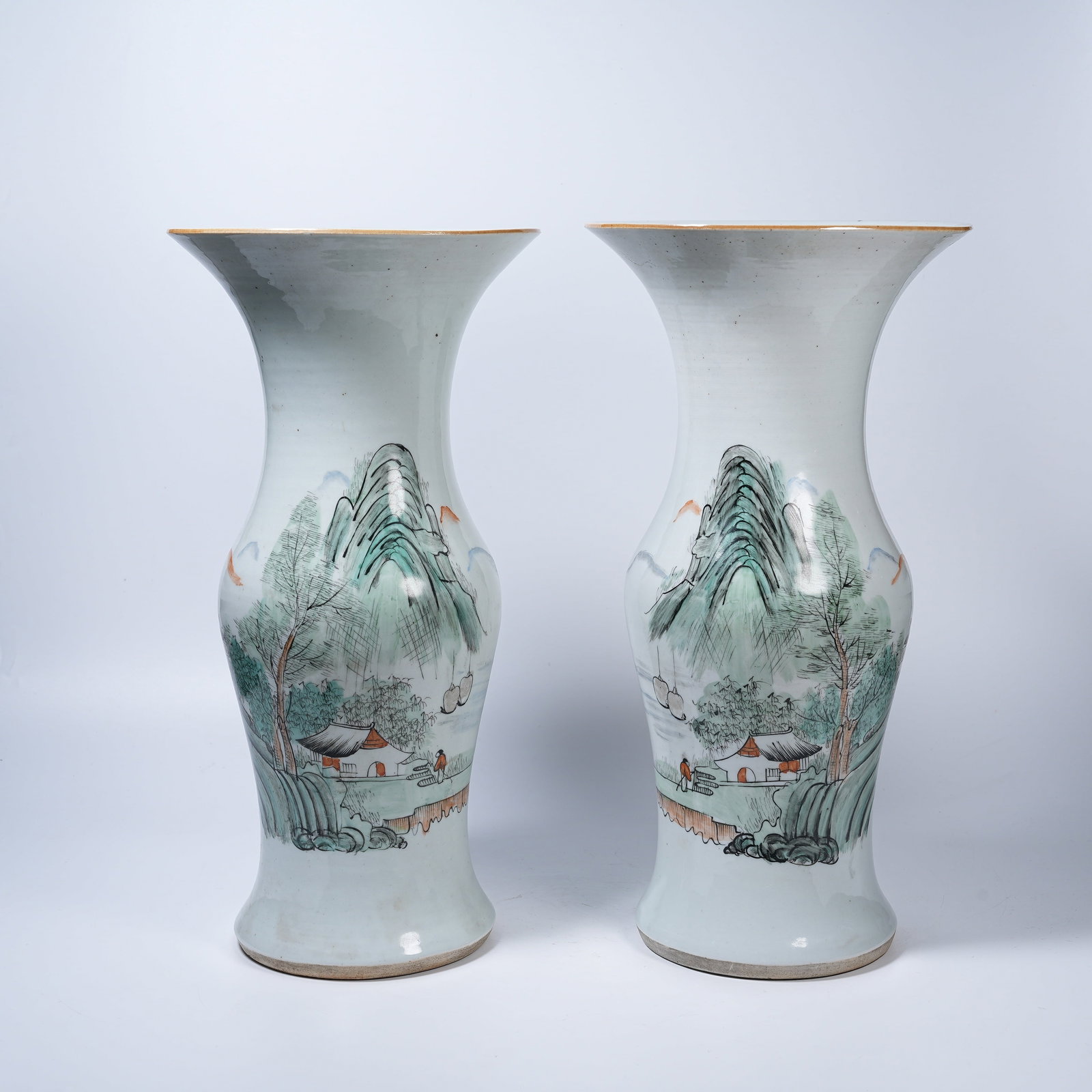 A FAMILLE ROSE GU VASE WITH LANDSCAPE PATTERNS: Famille Rose Gu Vase with Landscape Patterns