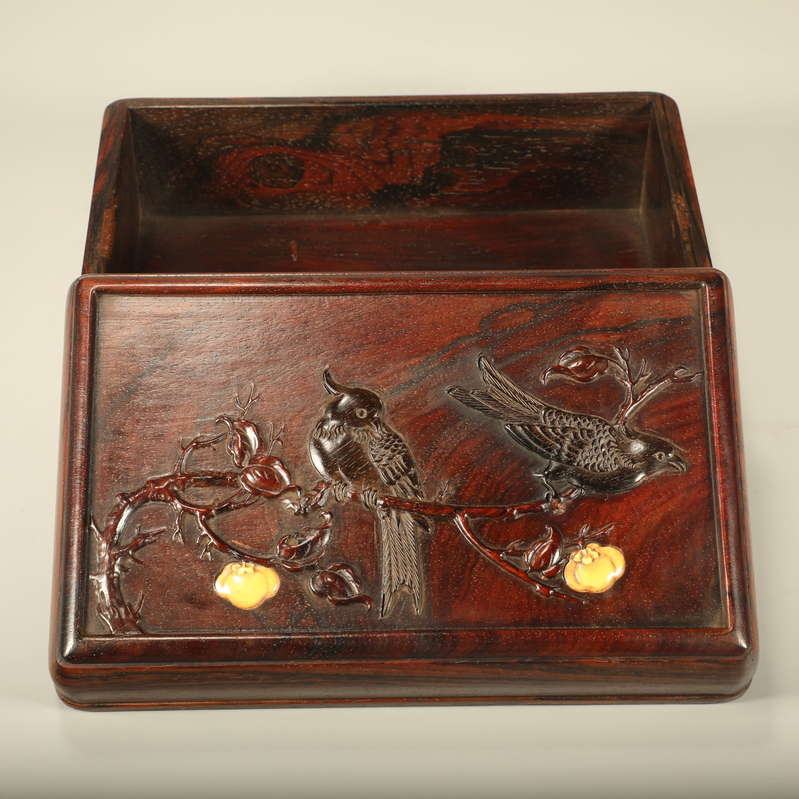 A PADAUK BOX CARVED WITH FLOWERS AND BIRDS: Padauk Box Carved with Flowers and Birds