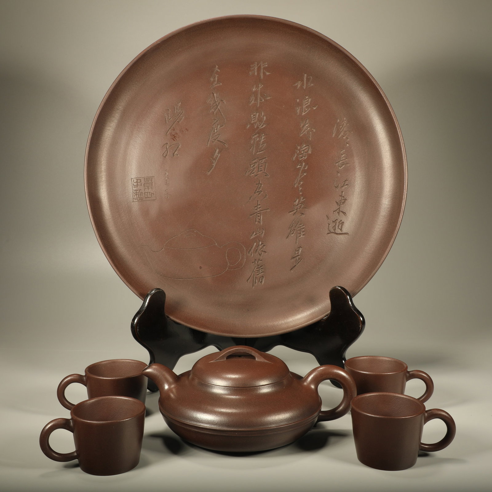 A SET OF SIX ZISHA LINEAR ROUND TEAPOT SUITE: Set of Six Zisha Linear Round Teapot Suite