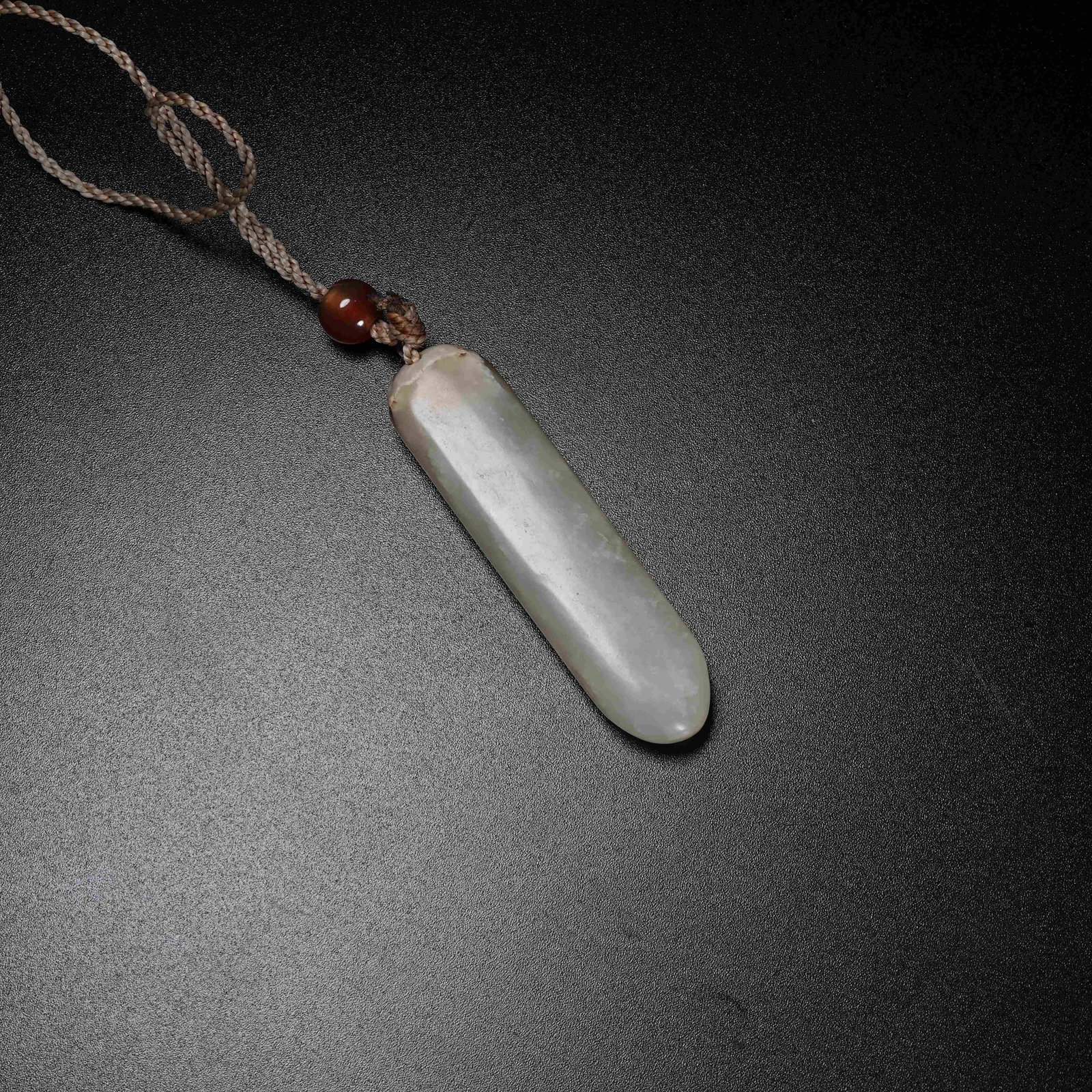 A ARCHAIC JADE LEZI: Archaic Jade Lezi