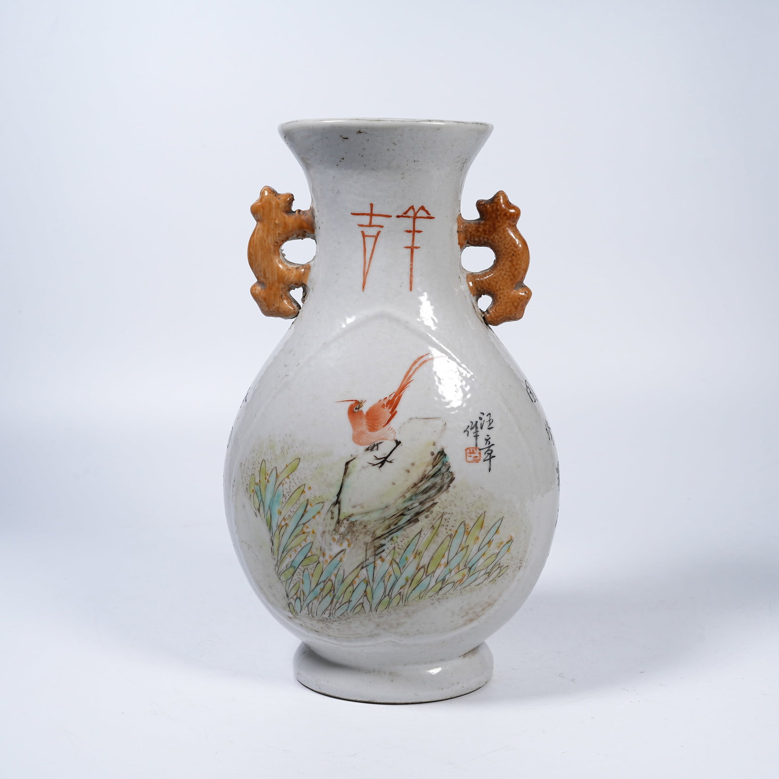 A FAMILLE ROSE IRON RED PHOENIX-EARED ZUN WITH FLOWER AND BIRD PATTERNS (1 of 9)