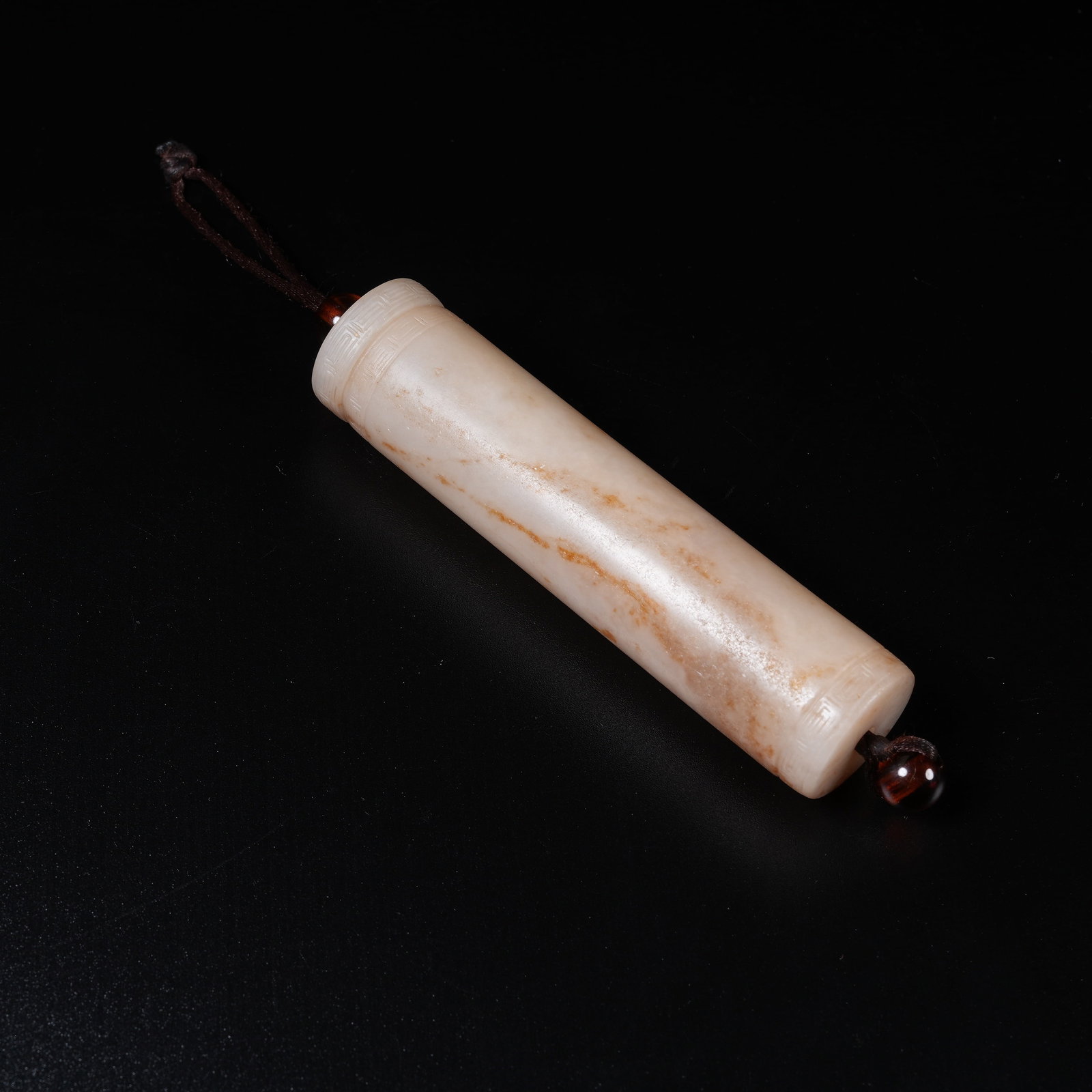 A MEDIEVAL JADE INCENSE TUBE (1 of 9)