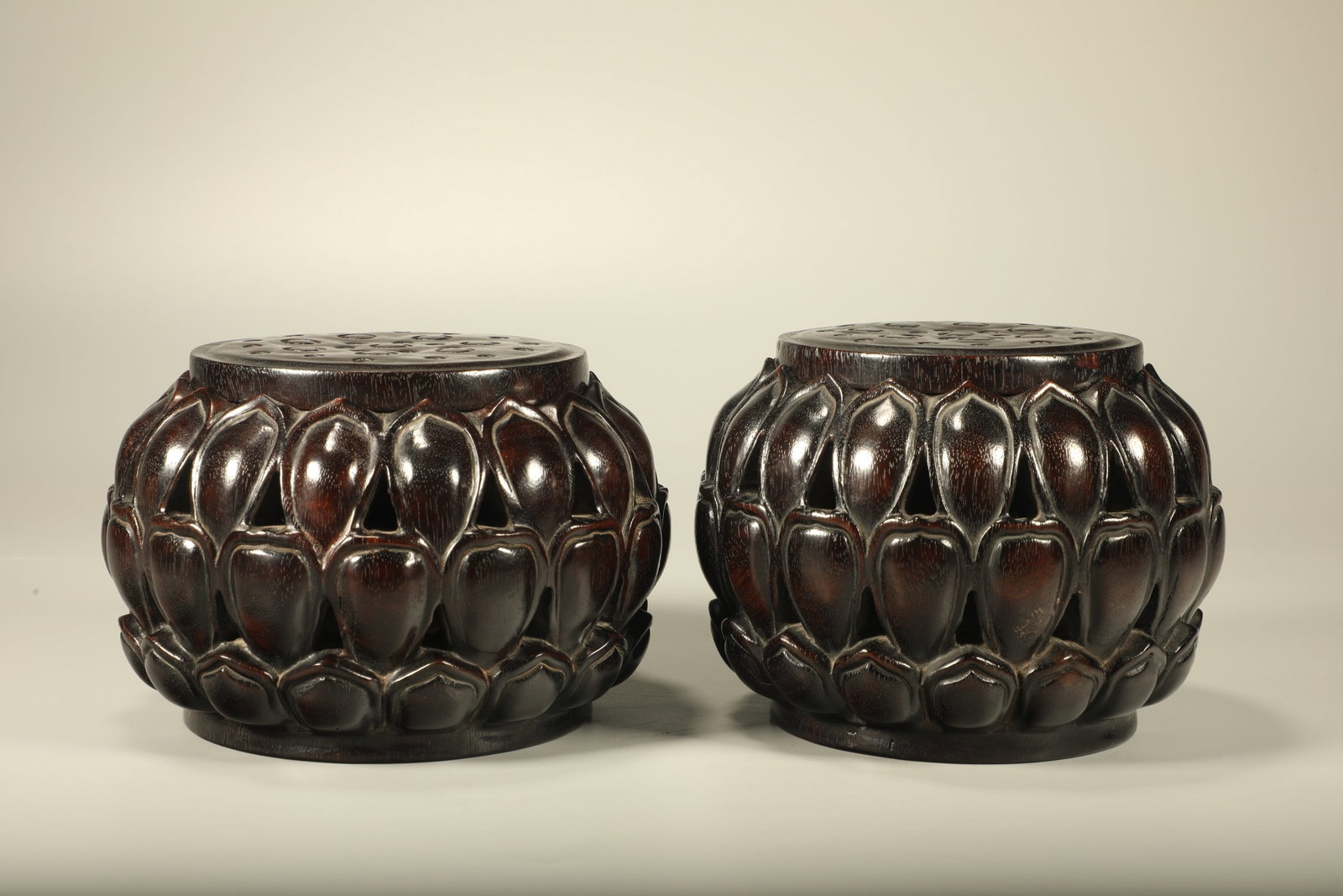 A PAIR OF RED SANDALWOOD INCENSE BURNERS CARVED WITH LOTUS PATTERNS: Pair of Red Sandalwood Incense Burners Carved with Lotus Patterns