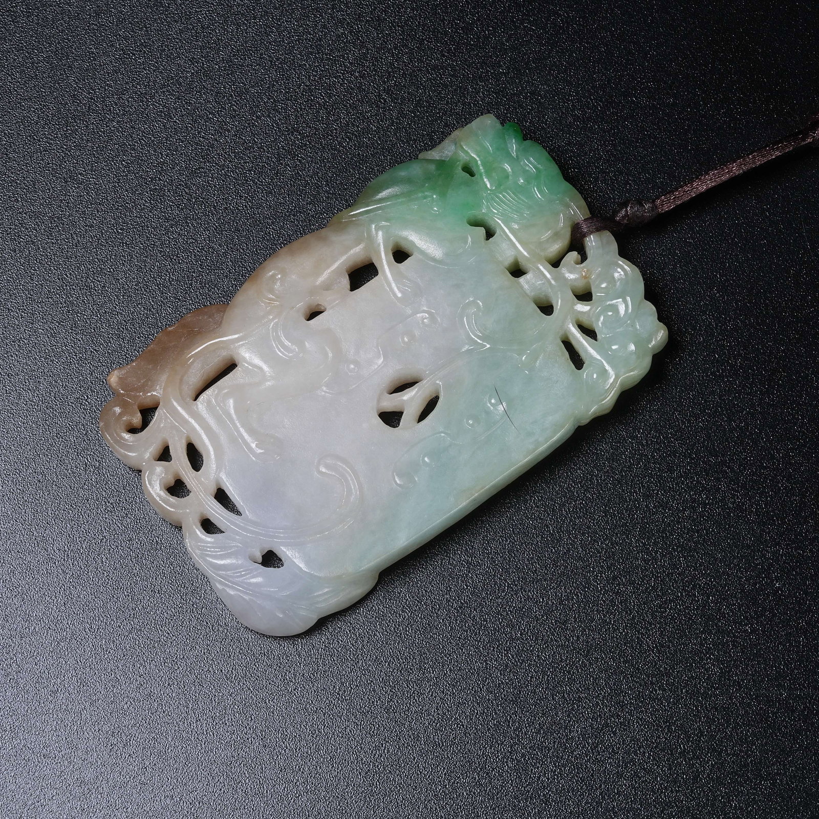 A JADEITE PLAQUE WITH CHI DRAGON PATTERN (1 of 9)