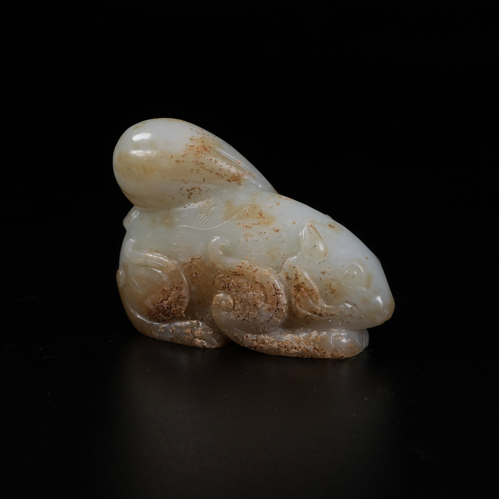 A ARCHAIC JADE RECUMBENT BEAST ORNAMENT: Archaic Jade Recumbent Beast Ornament