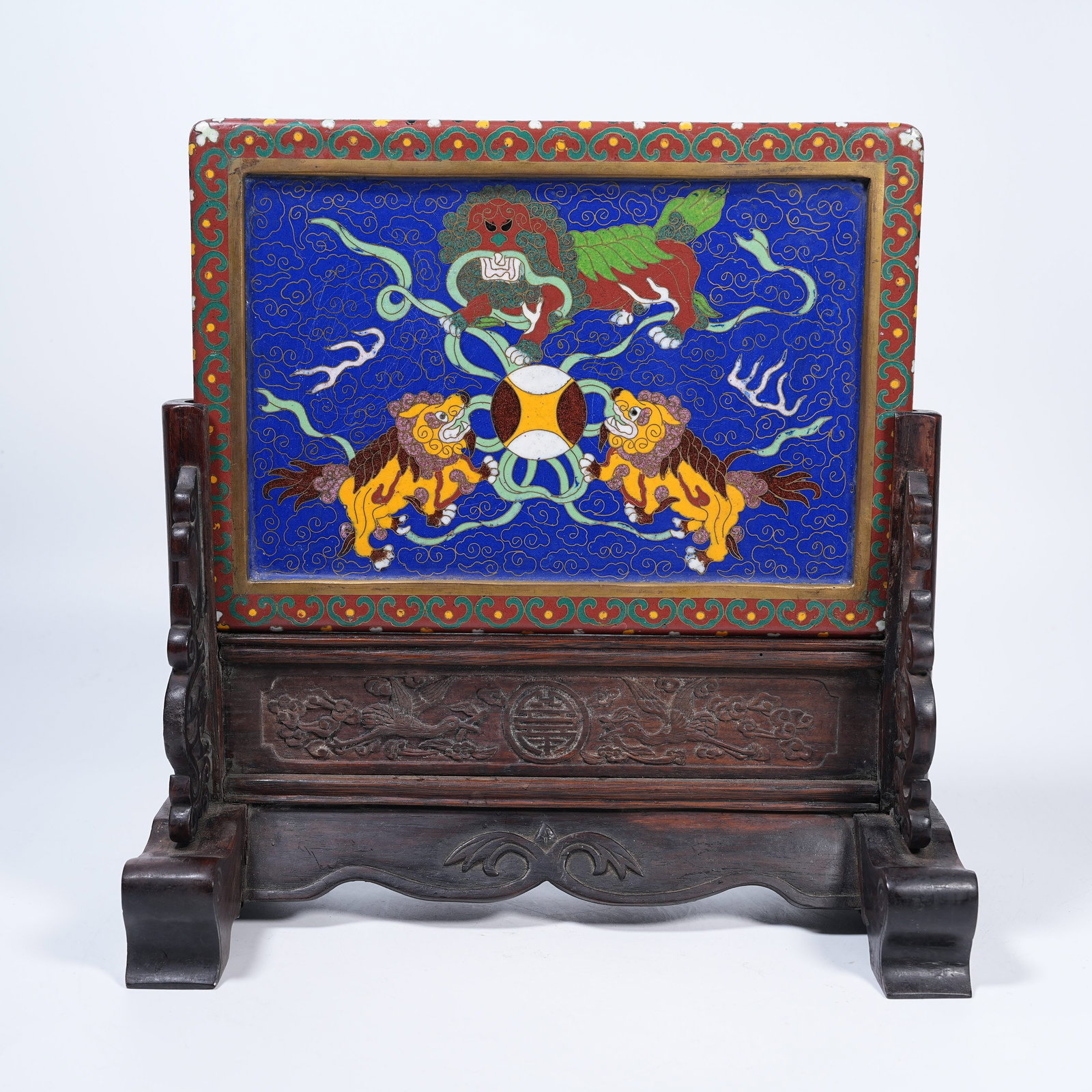 A RED SANDALWOOD TABLE SCREEN INLAID WITH CLOISONNE LION PLAYING BALL PATTERNS: Red Sandalwood Table Screen Inlaid with Cloisonne Lion Playing Ball Patterns
