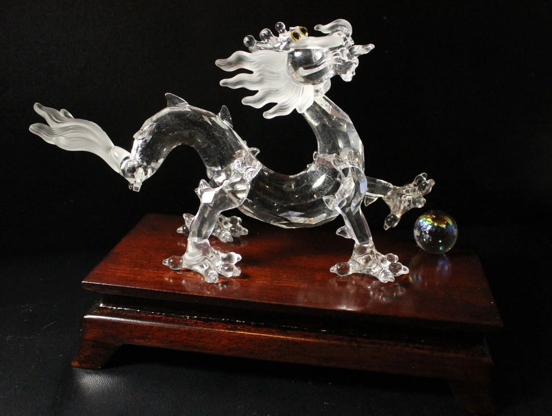 SWAROVSKI SILVER CRYSTAL ZODIAC DRAGON FIGURINE WITH CRYSTAL BALL ON WOODEN STAND: Swarovski Silver Crystal Zodiac Dragon Figurine with Crystal Ball on Wooden Stand