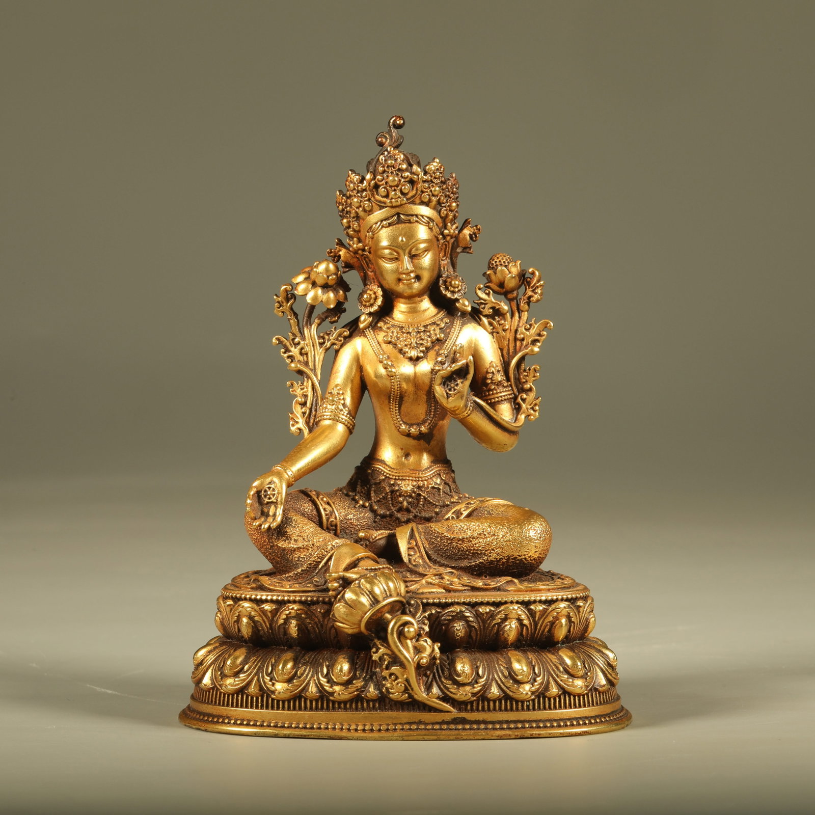 A GILT BRONZE STATUE OF WHITE TARA: Gilt Bronze Statue of White Tara