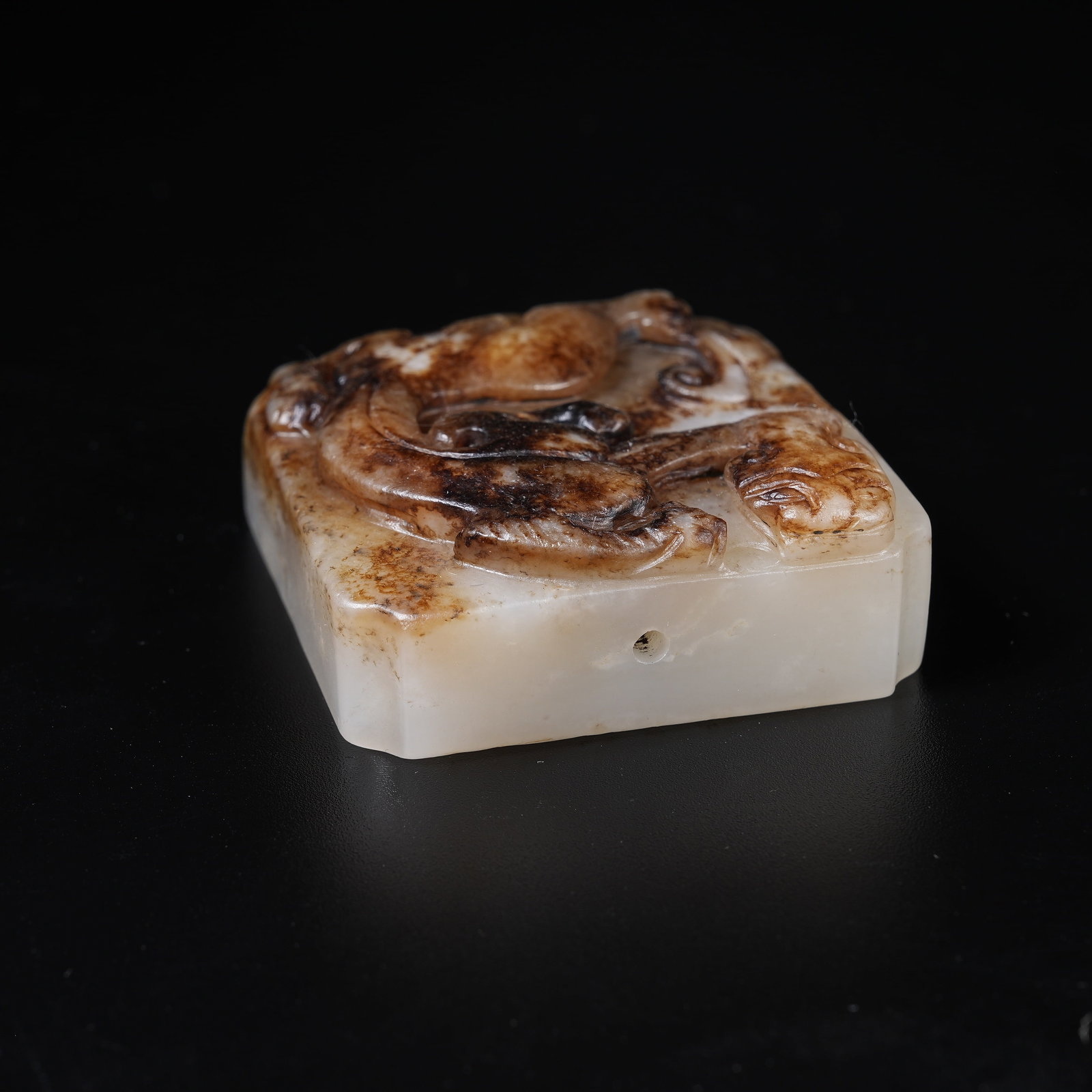 A ANCIENT JADE SQUARE WAISTED PENDANT CARVED WITH CHI DRAGON MOTIFS: Ancient Jade Square Waisted Pendant Carved with Chi Dragon Motifs