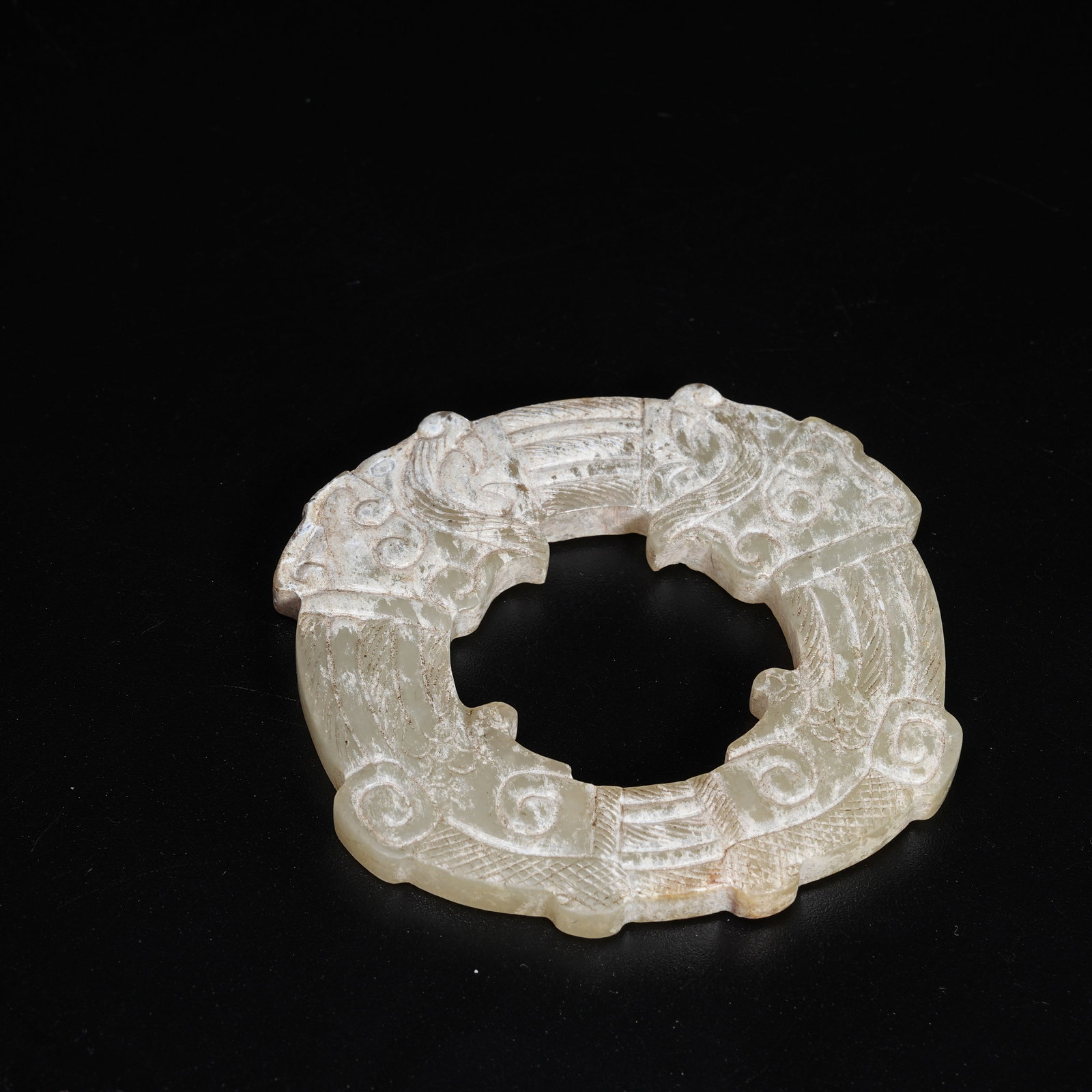 A ANCIENT JADE PENDANT WITH BEAST PATTERNS (1 of 10)