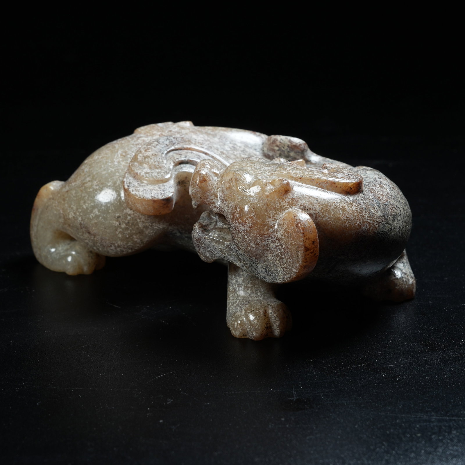 A ANCIENT JADE AUSPICIOUS BEAST ORNAMENT (1 of 8)