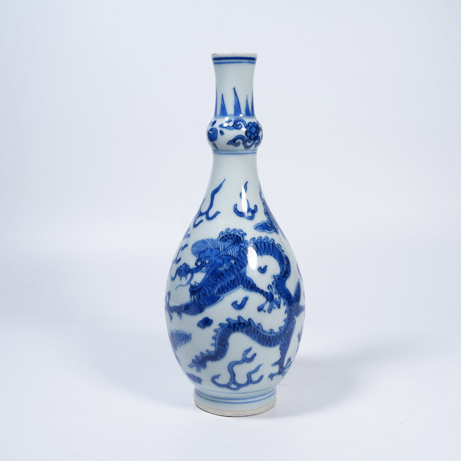 A BLUE AND WHITE GALLBLADDER VASE WITH DRAGONS CHASING PEARLS AMID CLOUDS: Blue and White Gallbladder Vase with Dragons Chasing Pearls Amid Clouds