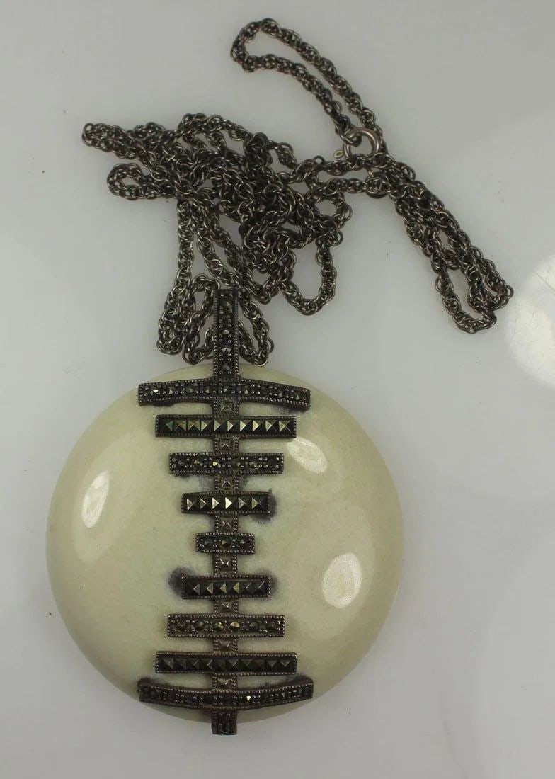 WHITE CERAMIC PENDANT WITH APPLIED STERLING (925) SILVER & MARCASITE DESIGN: White Ceramic Pendant with applied Sterling (925) Silver & Marcasite design