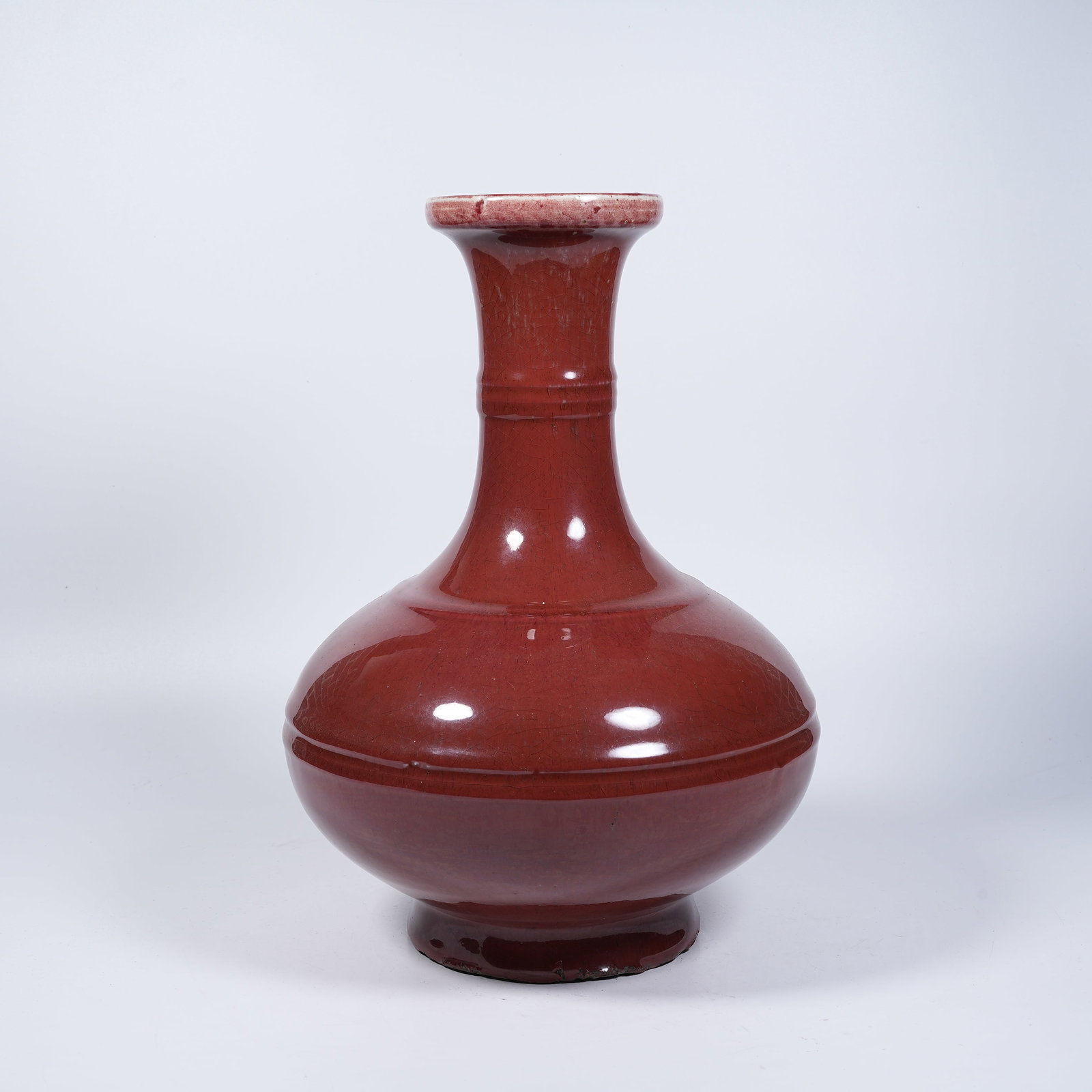 A BEAN RED GLAZE FLARED-MOUTH VASE WITH STRING LINE PATTERN: Bean Red Glaze Flared-mouth Vase with String Line Pattern