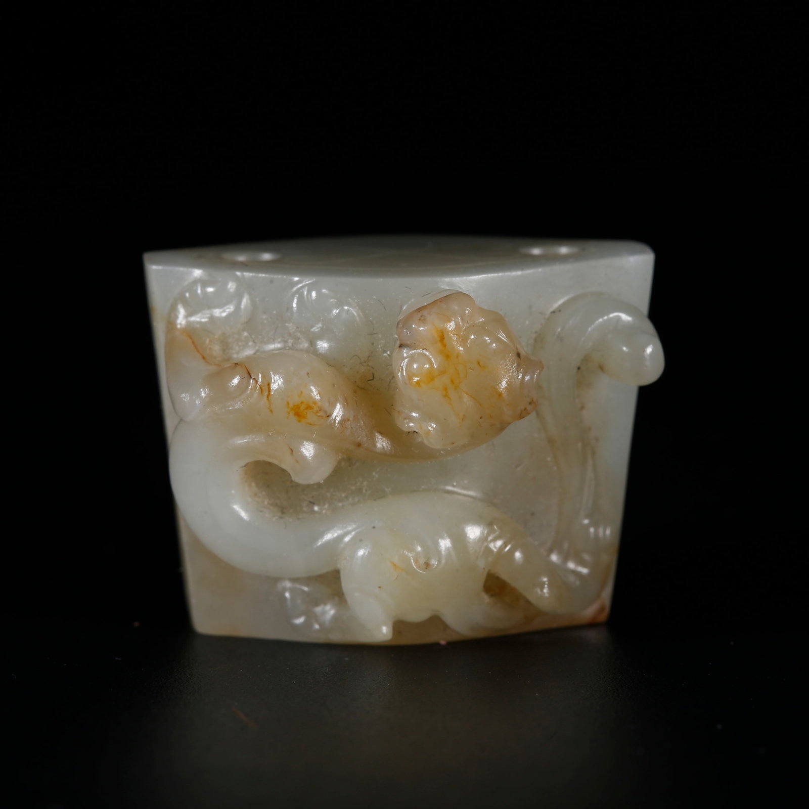 A HETIAN JADE PENDANT CARVED WITH DRAGON PATTERNS: Hetian Jade Pendant Carved with Dragon Patterns