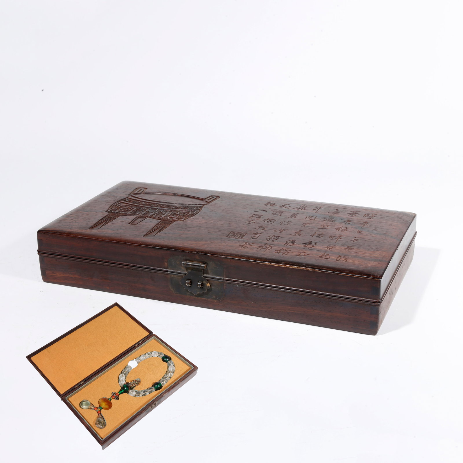 A RED SANDALWOOD CARVED COVERED BOX WITH TRIPOD PATTERN: Red Sandalwood Carved Covered Box with Tripod Pattern