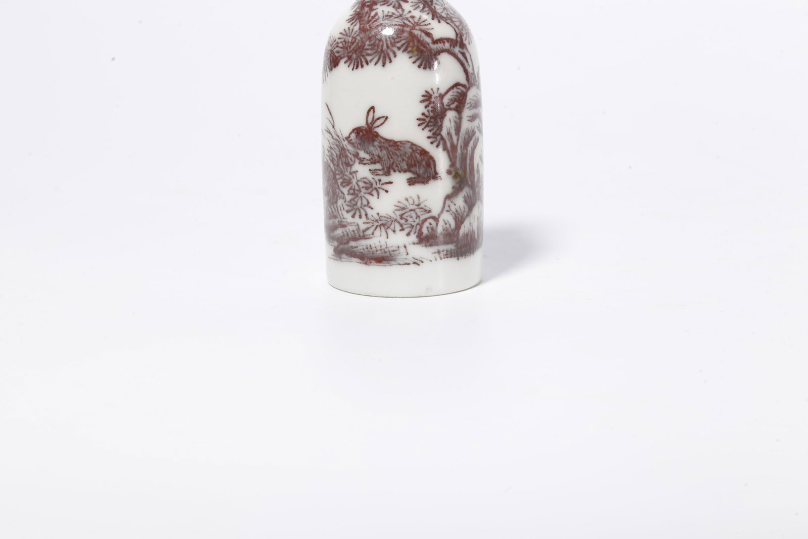 A UNDERGLAZE RED SNUFF BOTTLE WITH RABBIT PATTERNS - 5