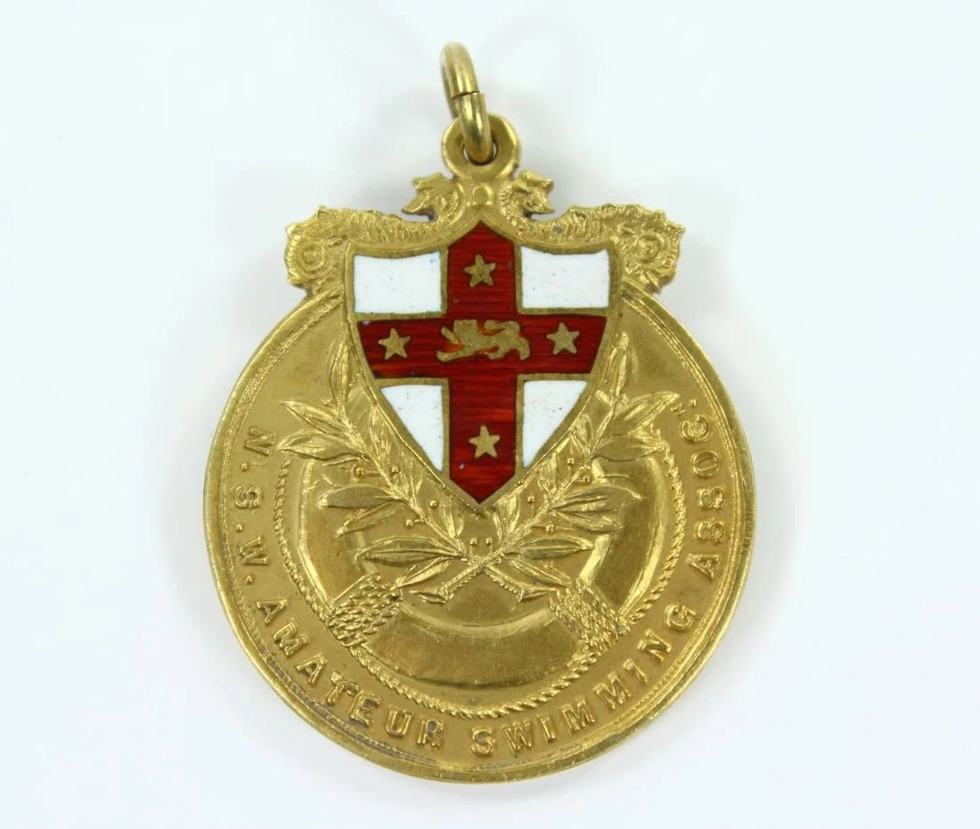 AUSTRALIA 1912 NSW AMATEUR SWIMMING ASSOCIATION PRIZE MEDAL FOR THE MILE CHAMPIONSHIP IN GOLD: Australia 1912 NSW Amateur Swimming Association Prize Medal for the Mile Championship in Gold