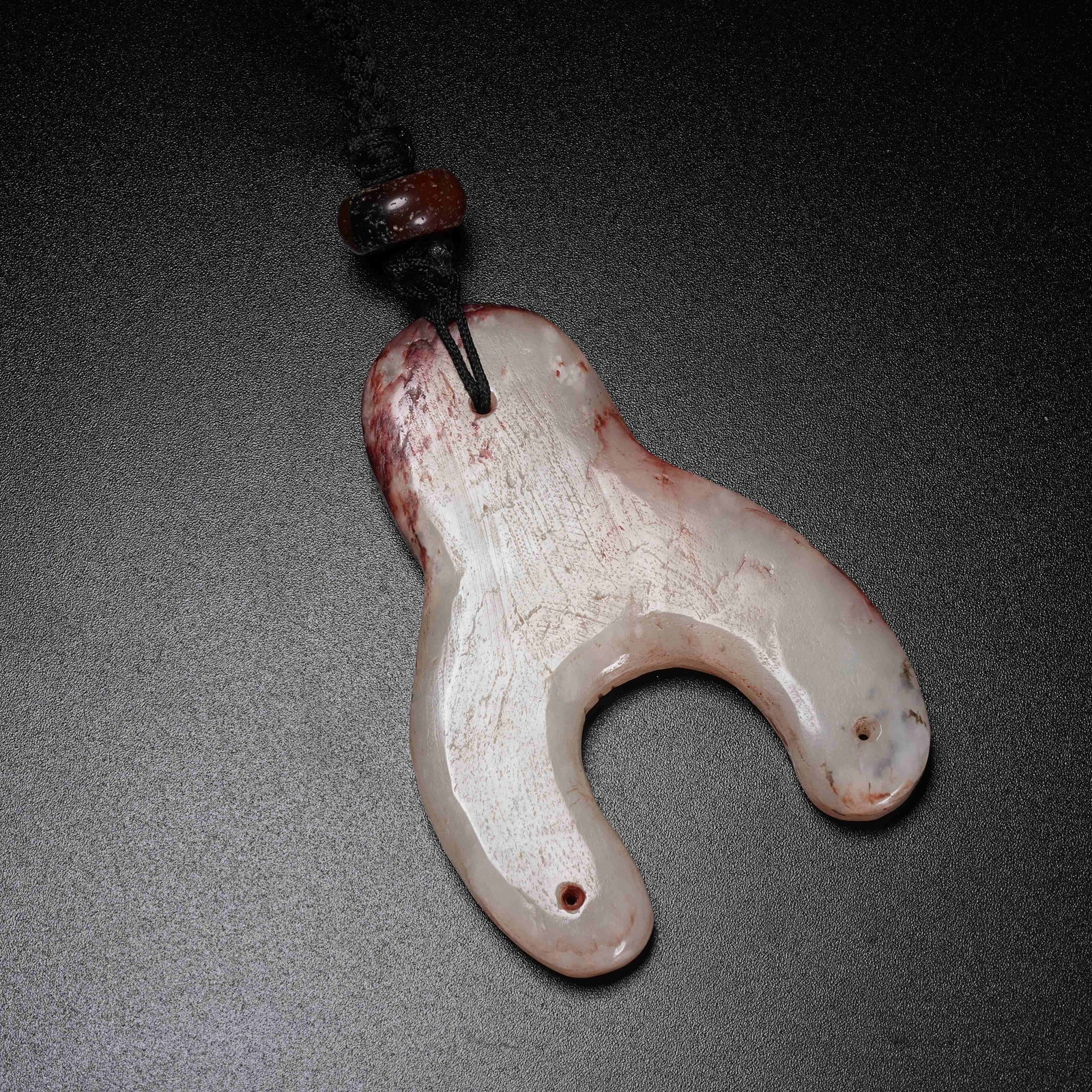 A ARCHAIC JADE PENDANT: Archaic Jade Pendant